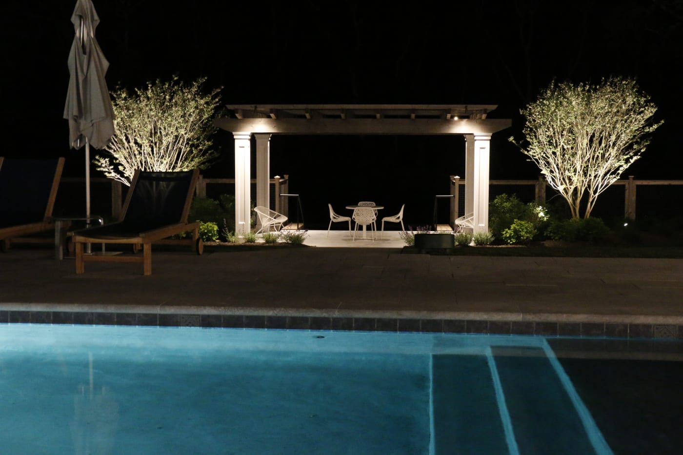 Outdoor entertainment and landscape lighting control at luxury Hamptons pool area