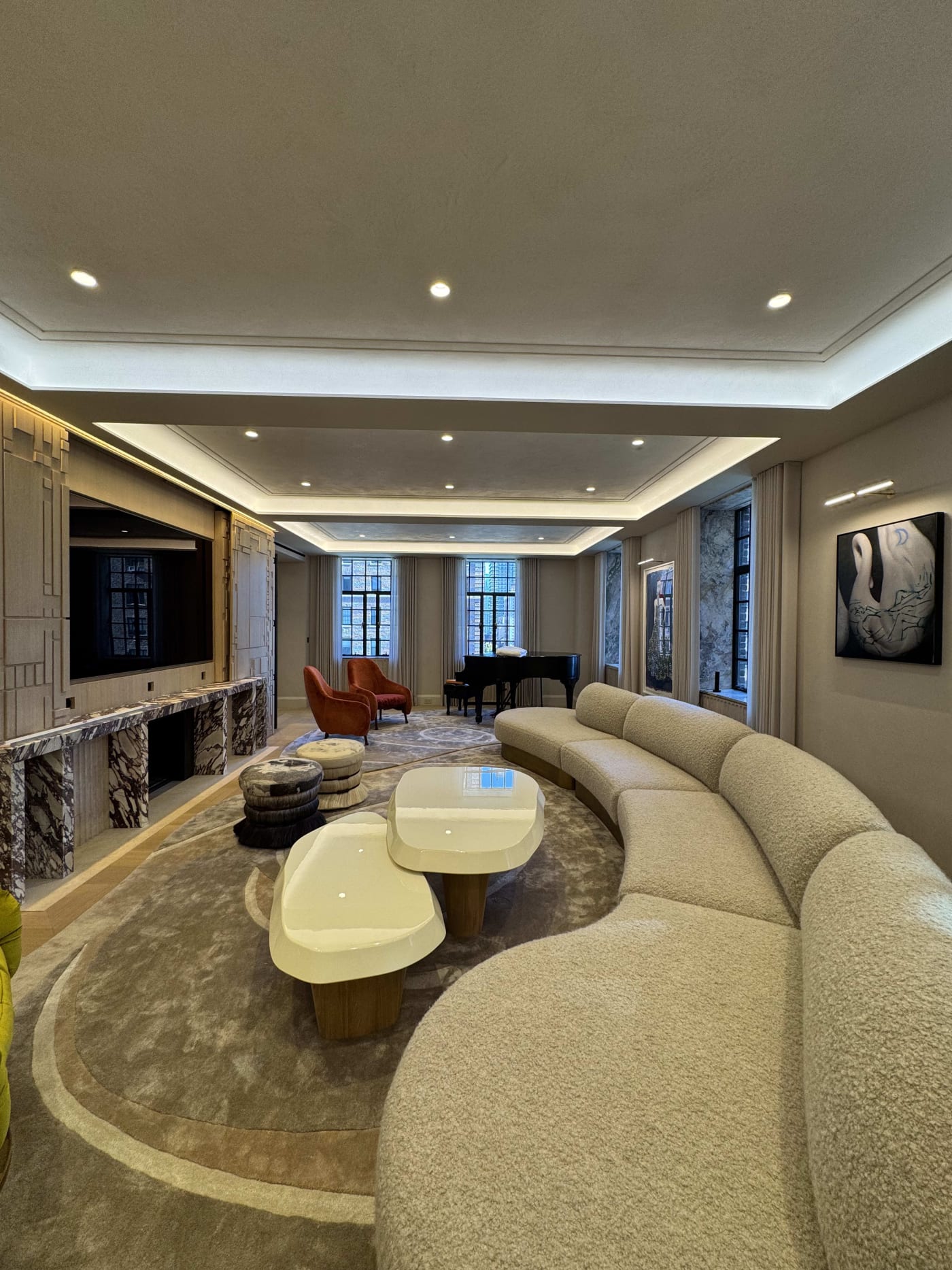 Luxury apartment media room with integrated lighting audio video and smart home entertainment