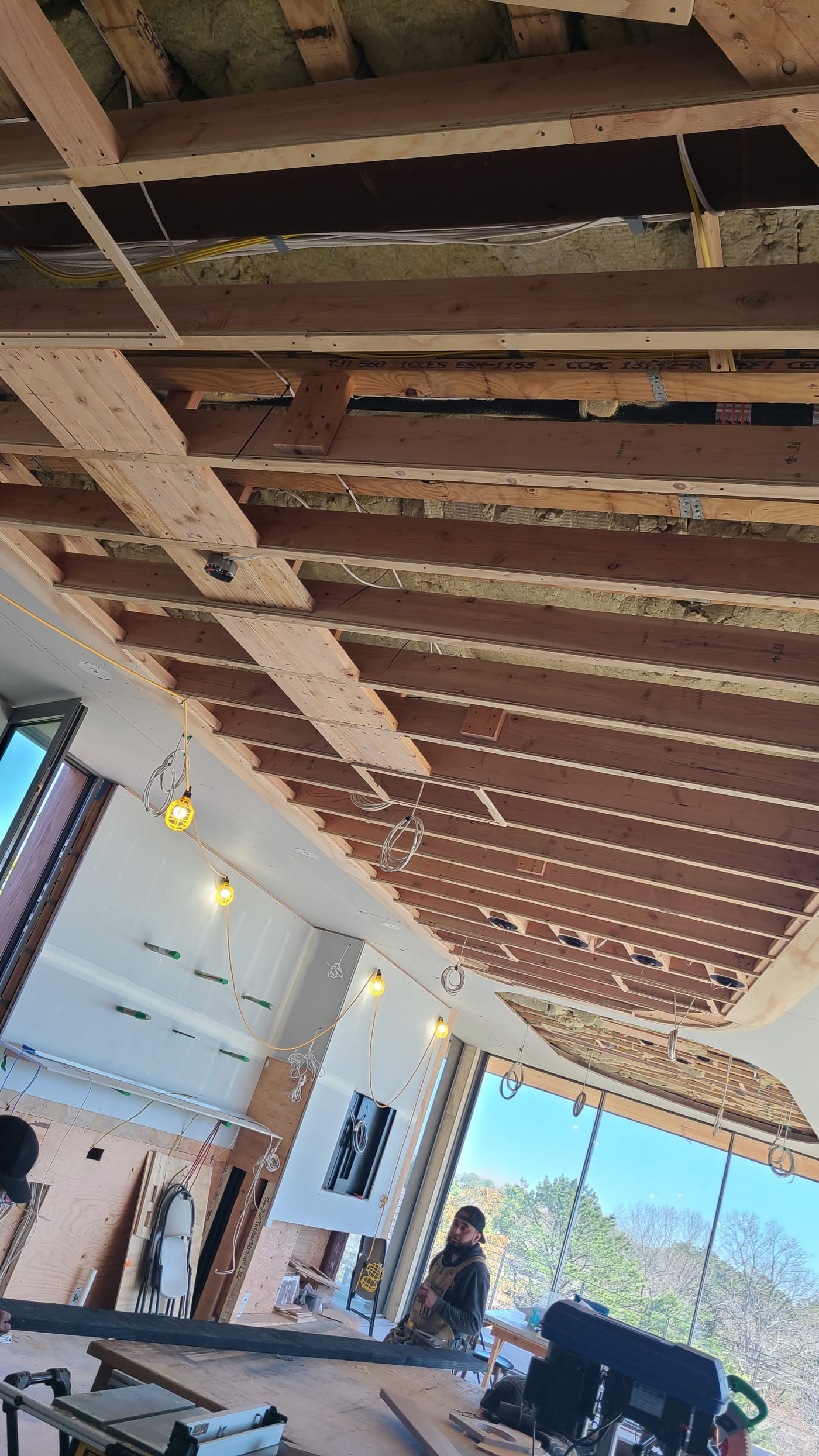 Structured cabling and access-point pathways planned during construction for whole-home Wi-Fi