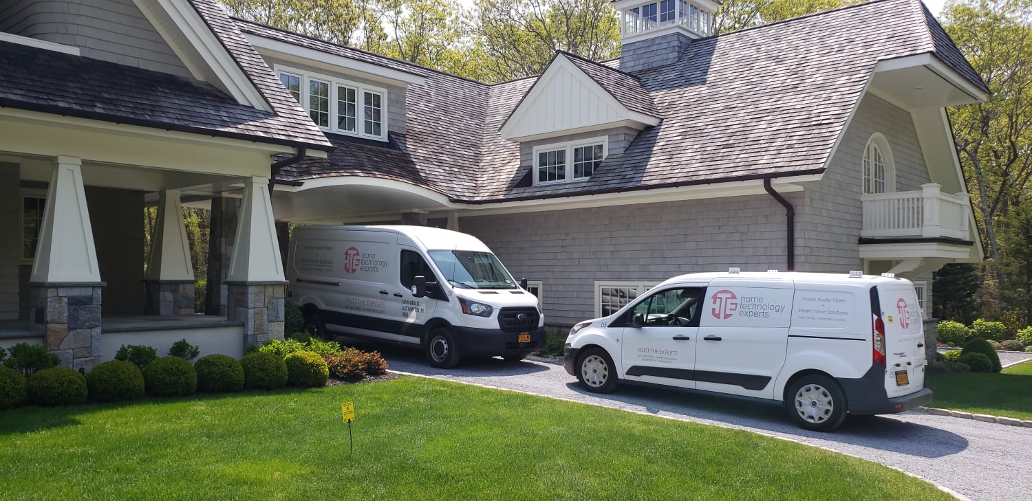 HTE service vehicles at a large Hamptons estate for network and Wi-Fi installation
