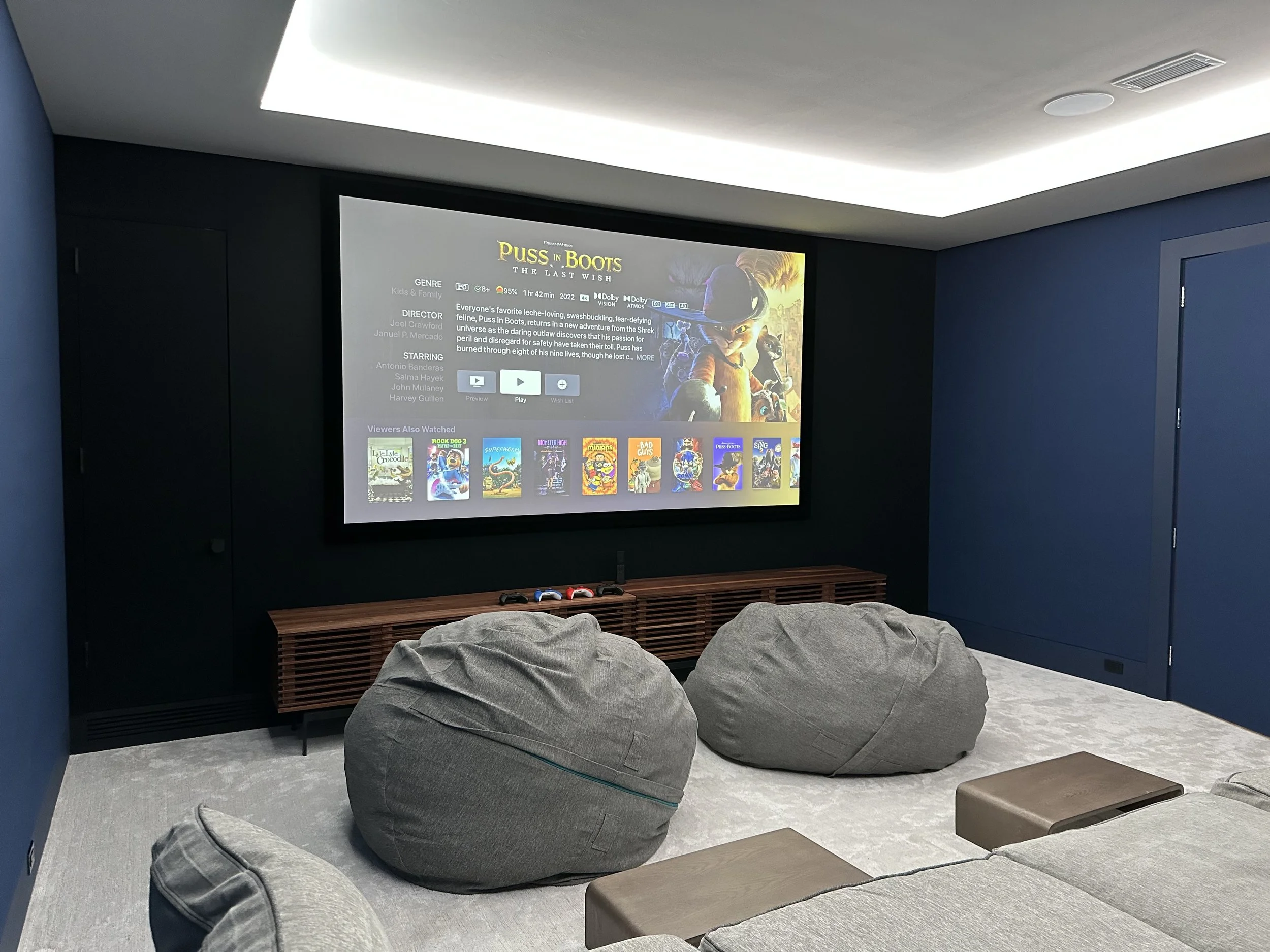 Luxury media room with large display — HTE installation