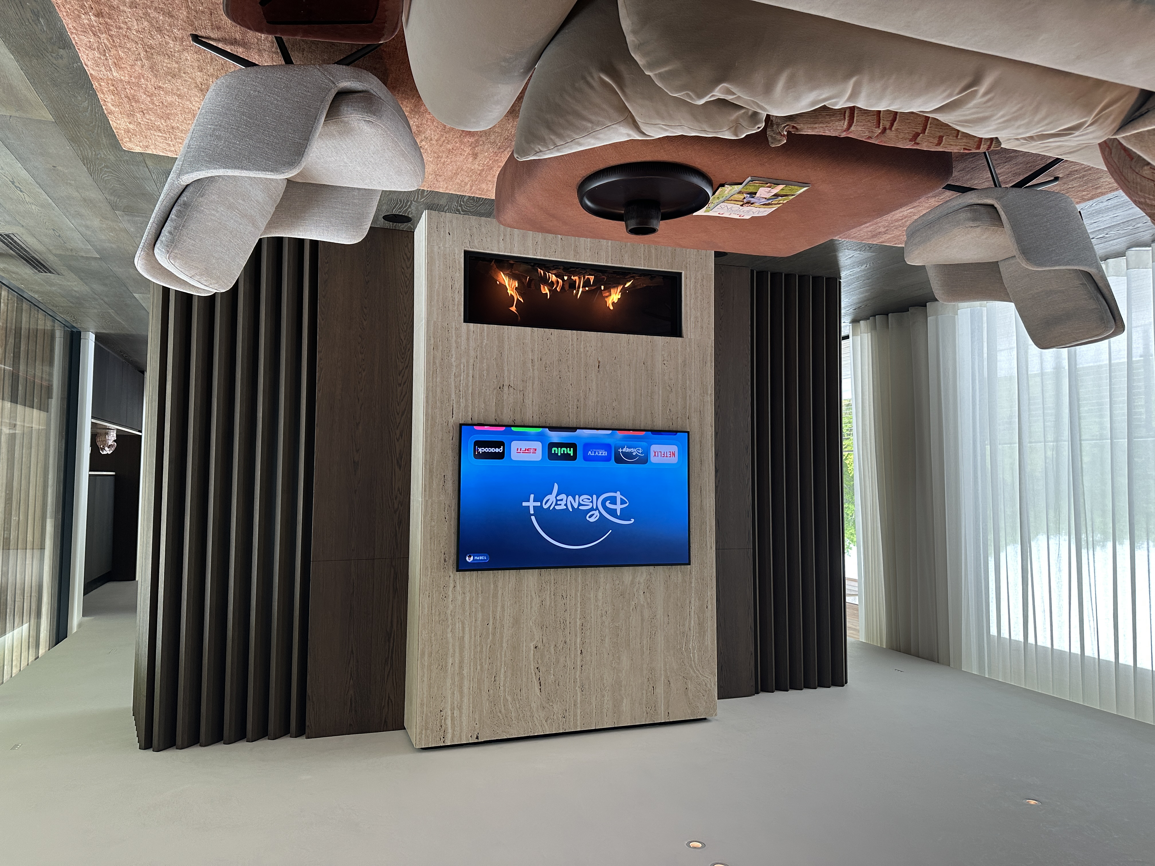 Technology-integrated flush-mount detail in a residence