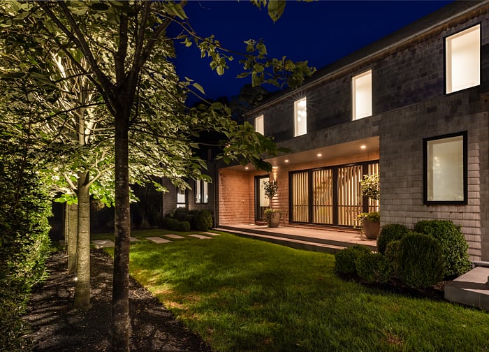Luxury landscape lighting installation — East Hampton