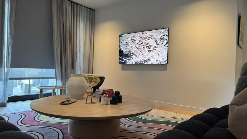 HTE TV installation luxury living room — Hamptons smart home