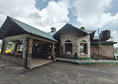 Café Cherrapunjee & Inn