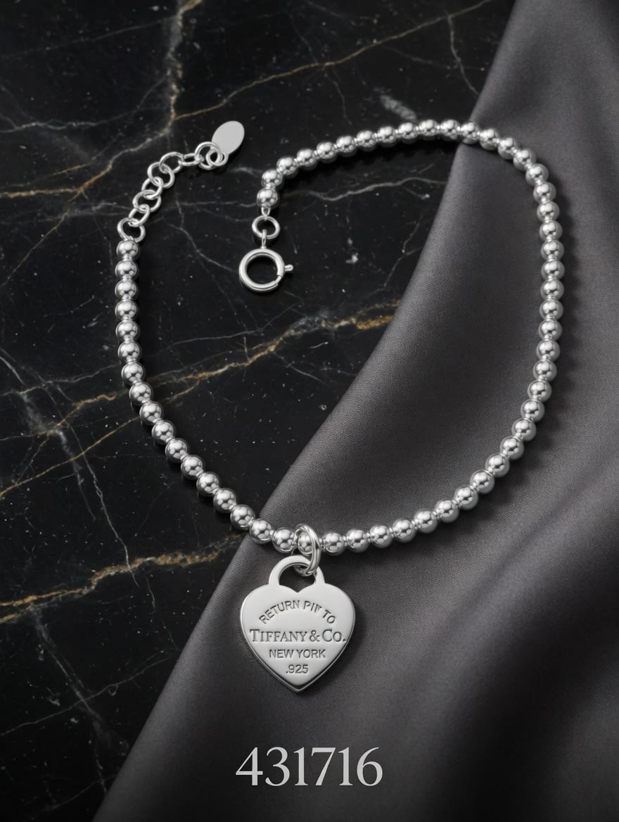 PULSERA MACIZA BOLAS CON DIJE TIF CORAZON PLT. IMPORTANTE - miniatura 2