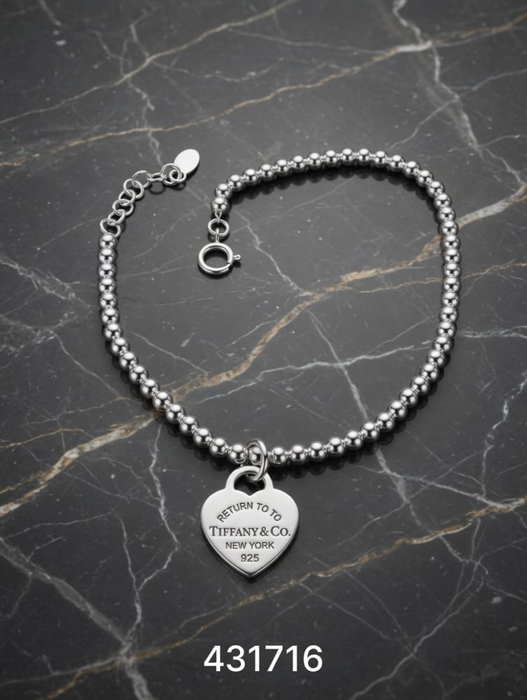 PULSERA MACIZA BOLAS CON DIJE TIF CORAZON PLT. IMPORTANTE