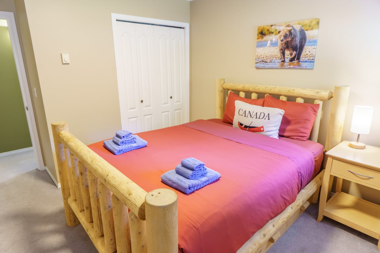A made up bedroom in a Vancouver Island vacation rental
