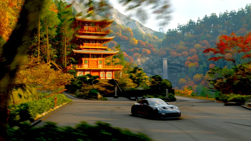Autumn Drive Past Pagoda — high-resolution wallpaper (2866×1612)