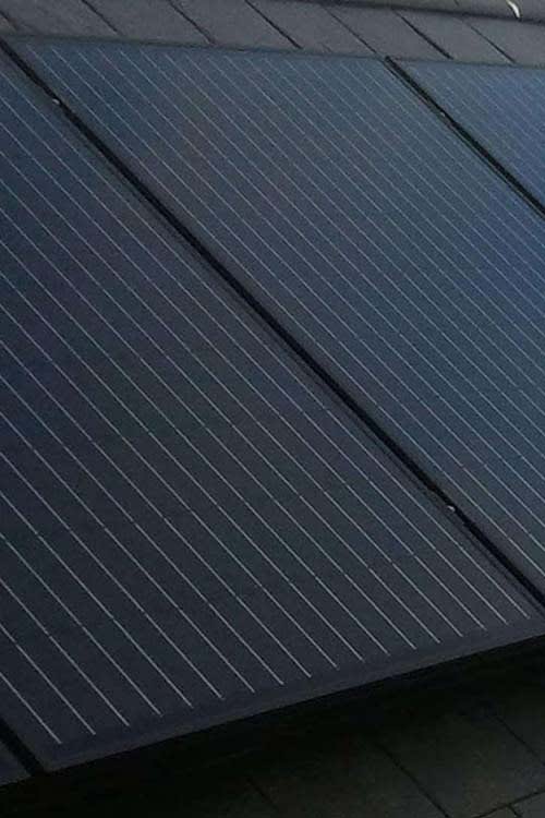 Professional solar panel installation on UK home