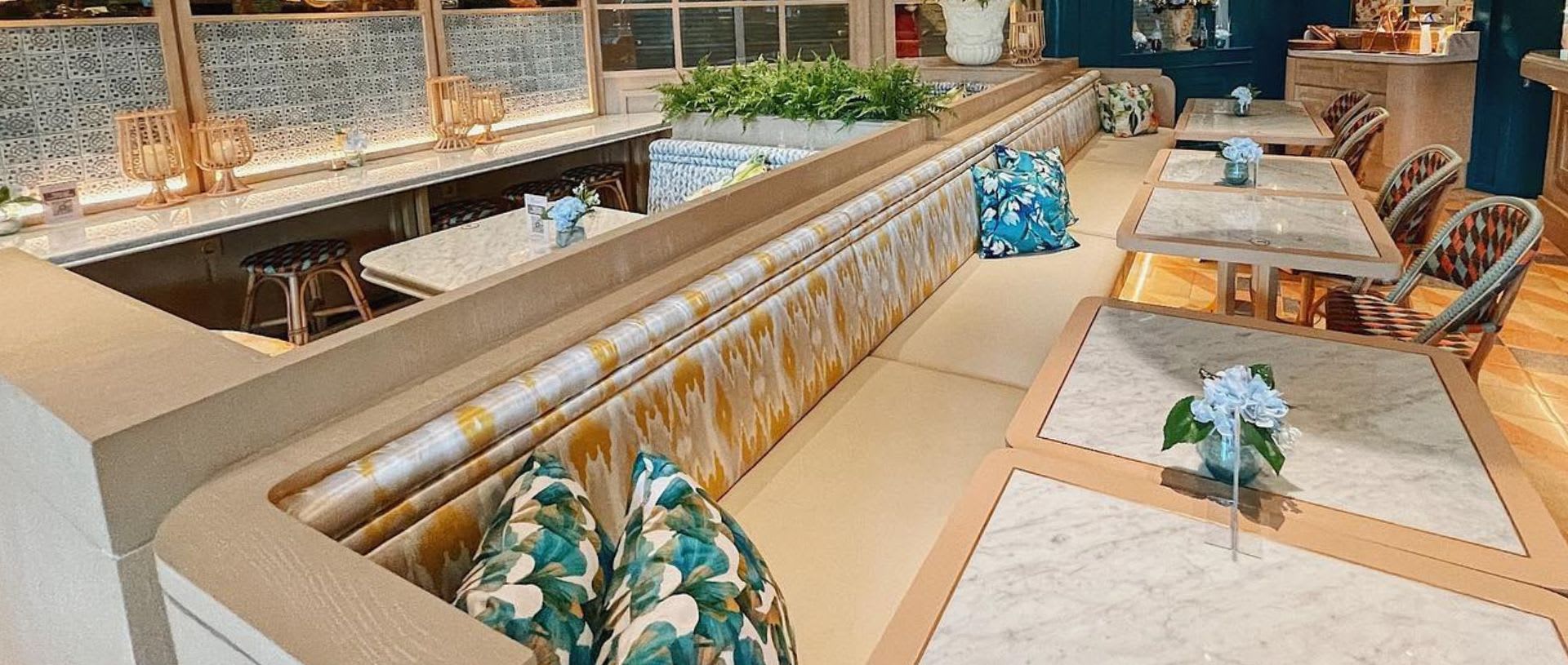 monsieur_spoon_cafe_seating_area_image_patterned_benches_marble_tables_decorative_pillows_upholstery_csl_leather_durango_fpz_5124.jpg_ctrjwz.jpg