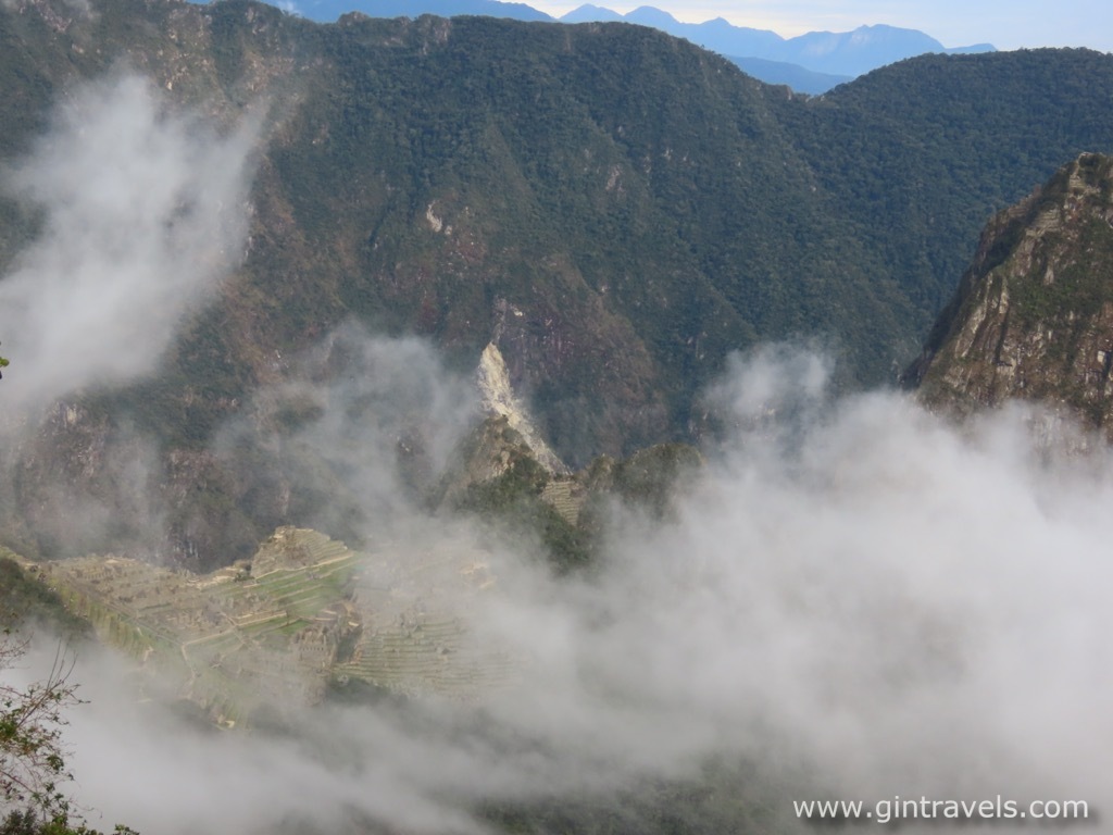 The clouds moving away from Machu Picchu