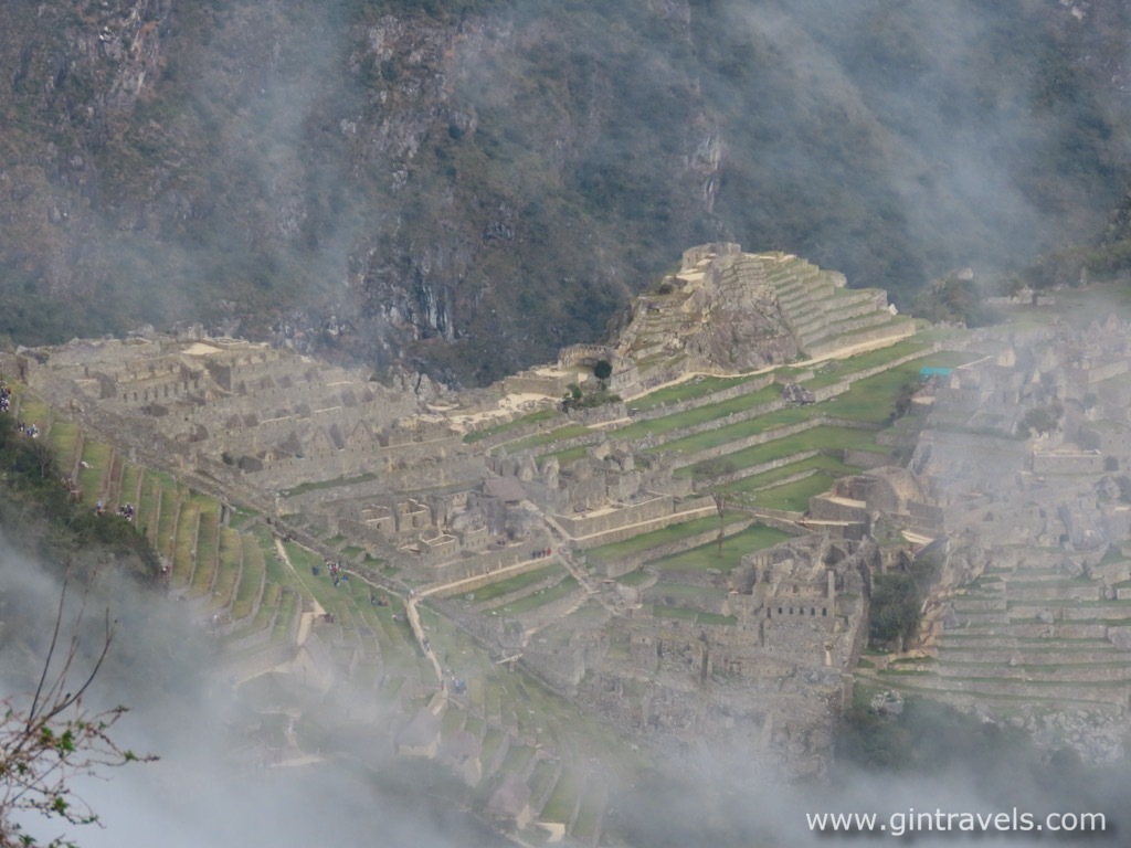Machu Picchu site appearing out of clouds