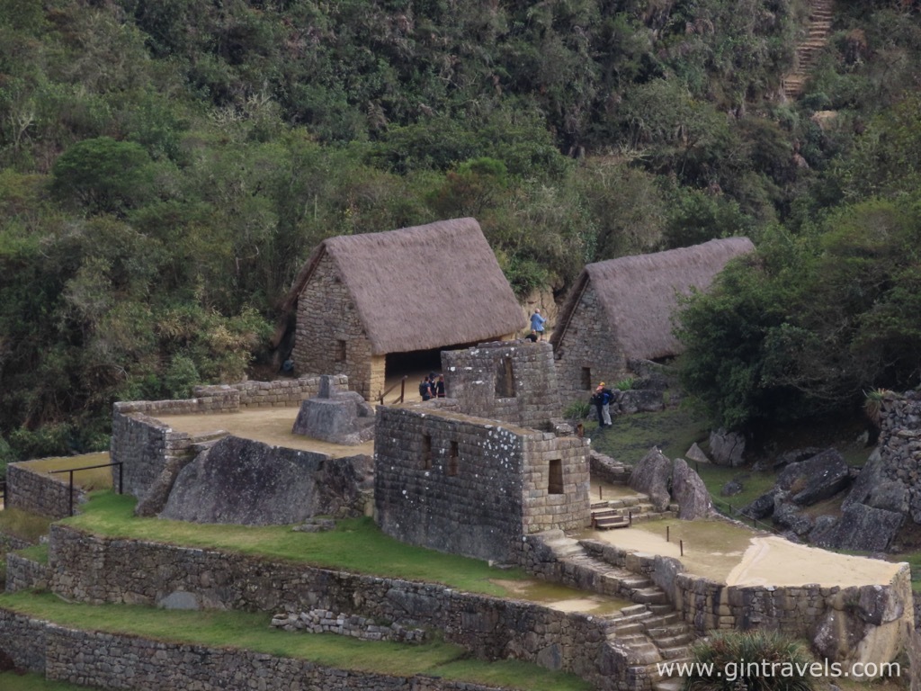 Intihuatana stone visible from far with a zoom