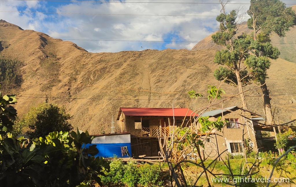 Another settlement visible through the window