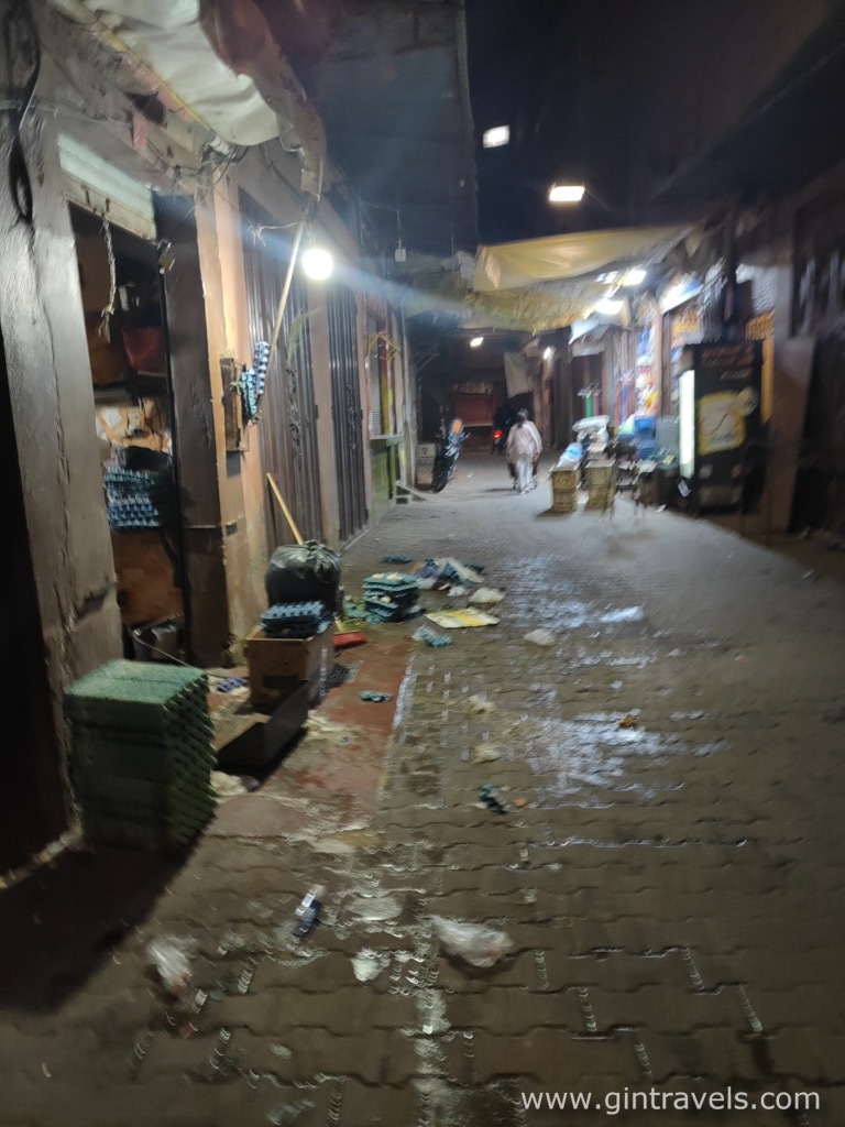 Marrakesh street late at night full with trash, Morocco
