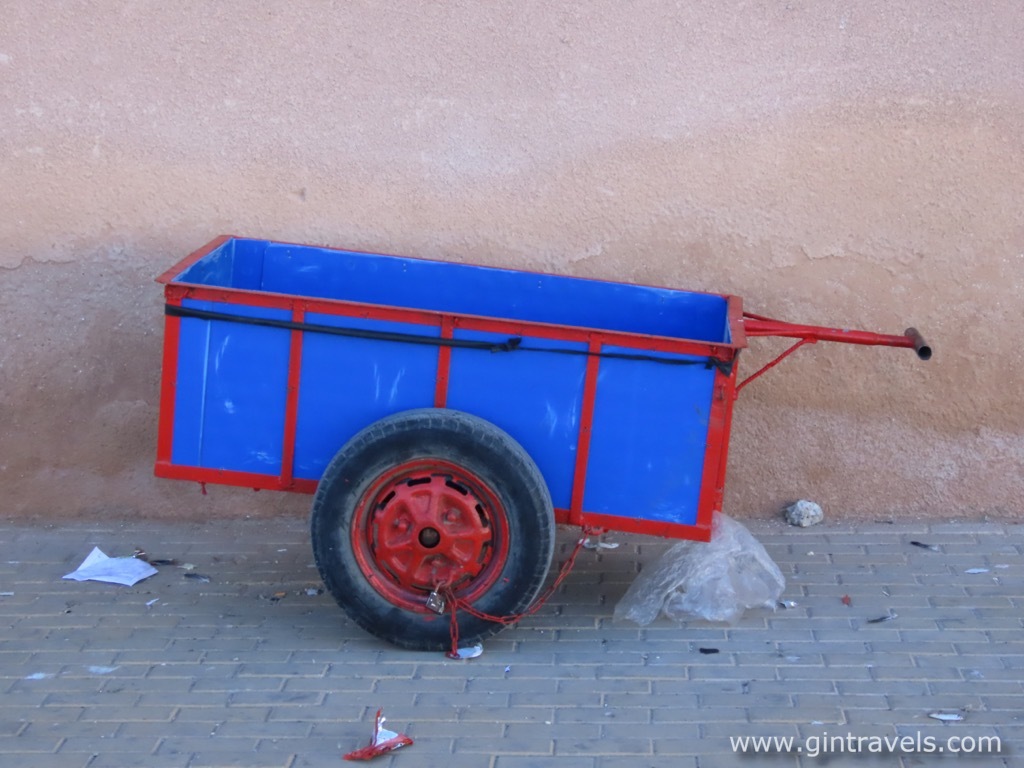 Cart with locked wheel and the trash around