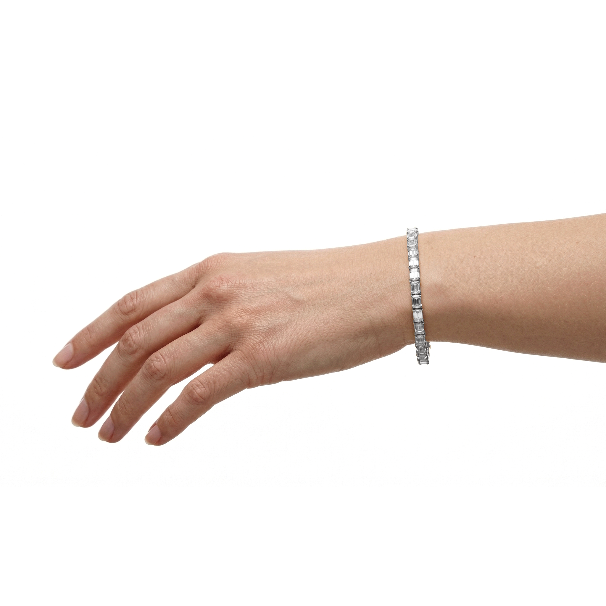 Jude emerald cut east west diamond tennis bracelet in white gold — earth and grown diamonds by Amber Arc – view 4