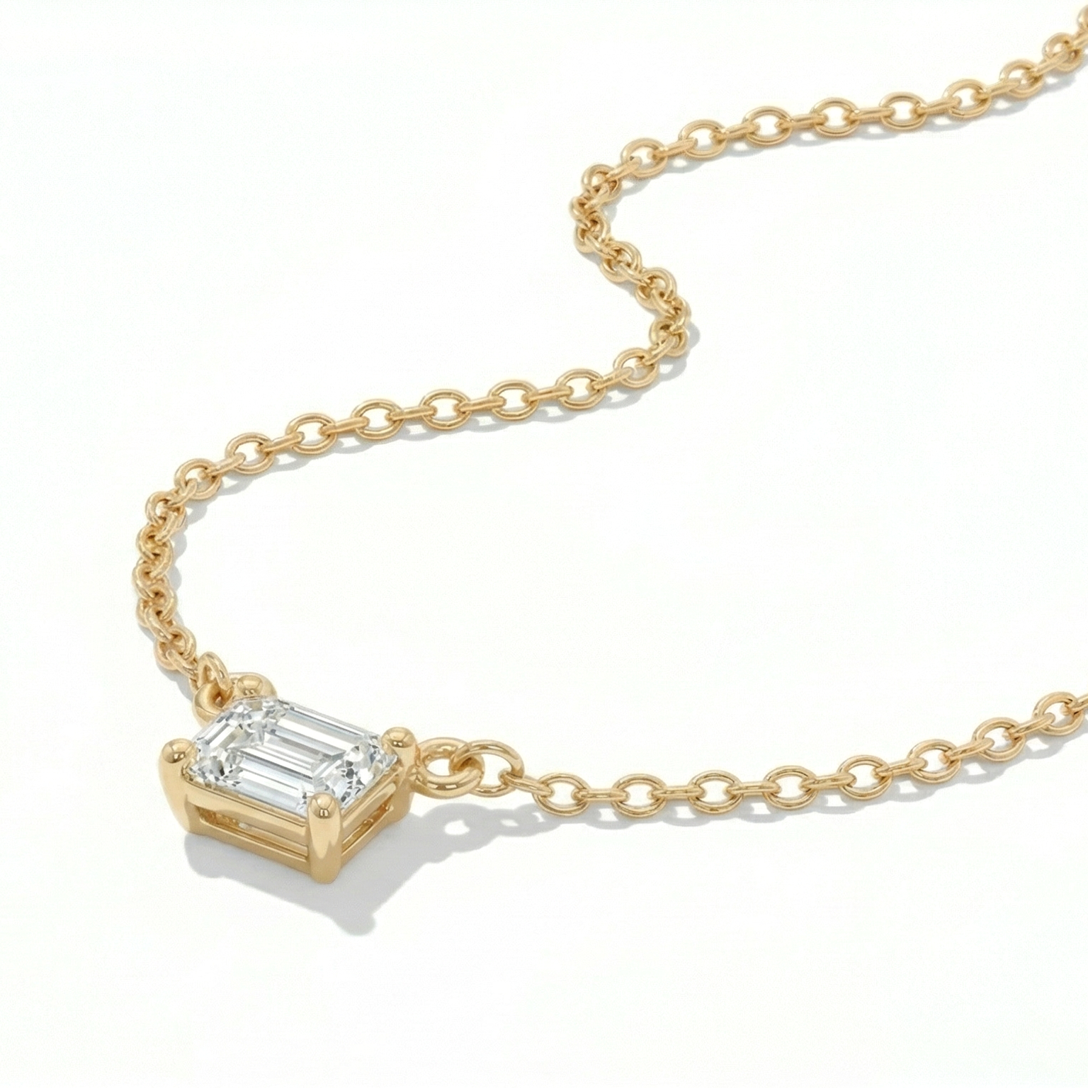 Jude east west emerald cut diamond pendant in yellow gold on cable chain — earth and grown diamonds by Amber Arc – view 2
