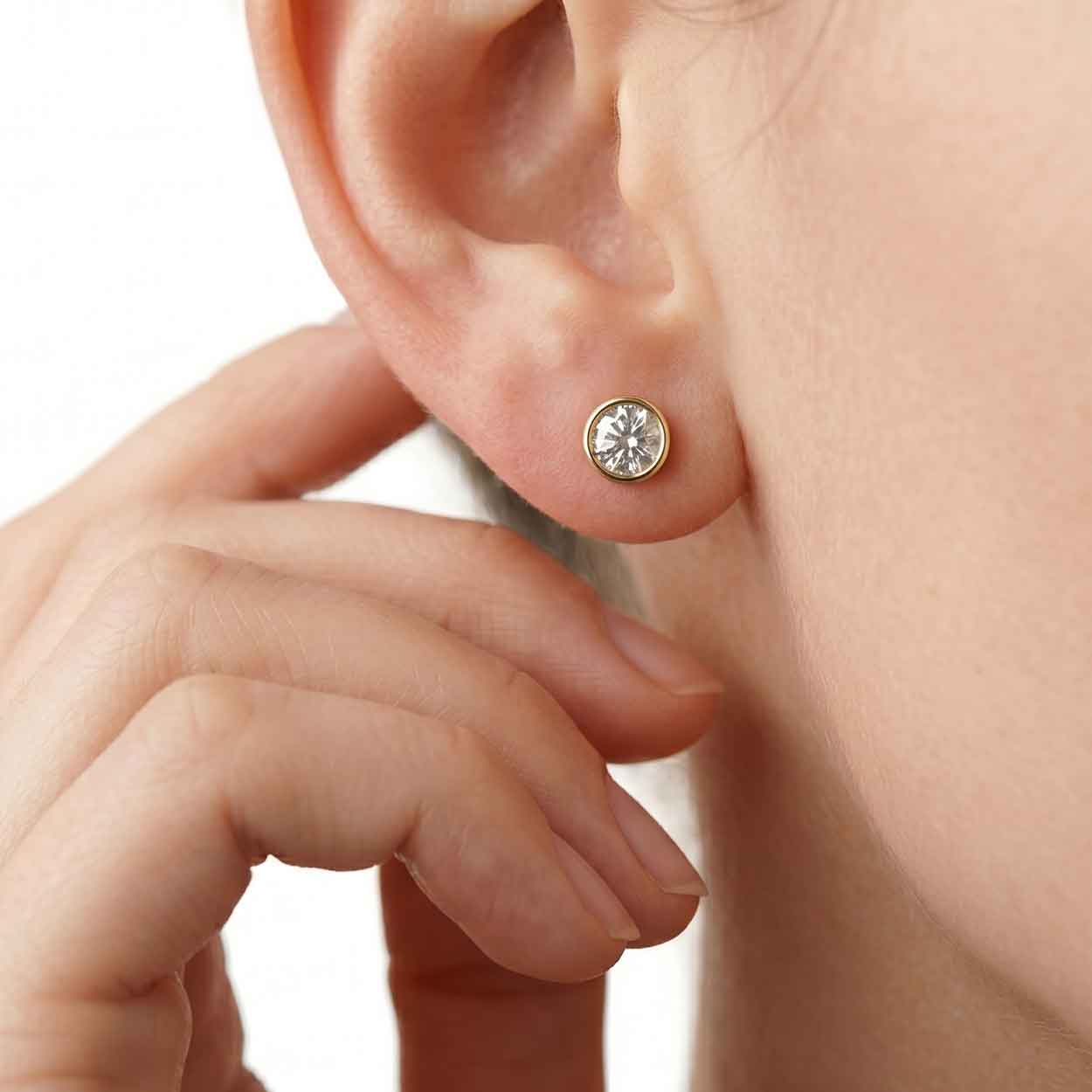 Valencia bezel round brilliant diamond stud earrings in white gold — earth and grown diamonds by Amber Arc – view 4