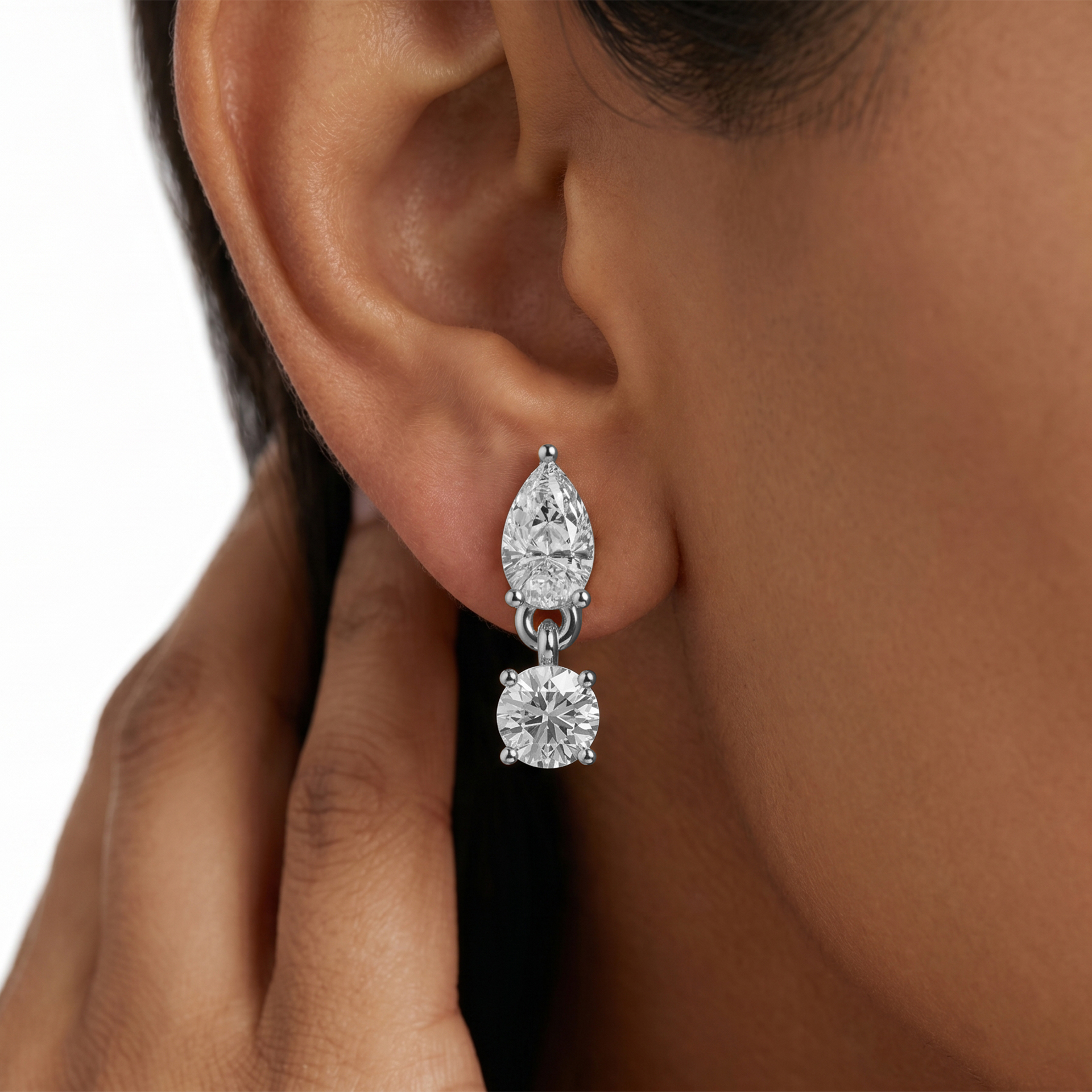 Numa pear and round drop diamond earrings in rose gold — earth and grown diamonds by Amber Arc – view 4