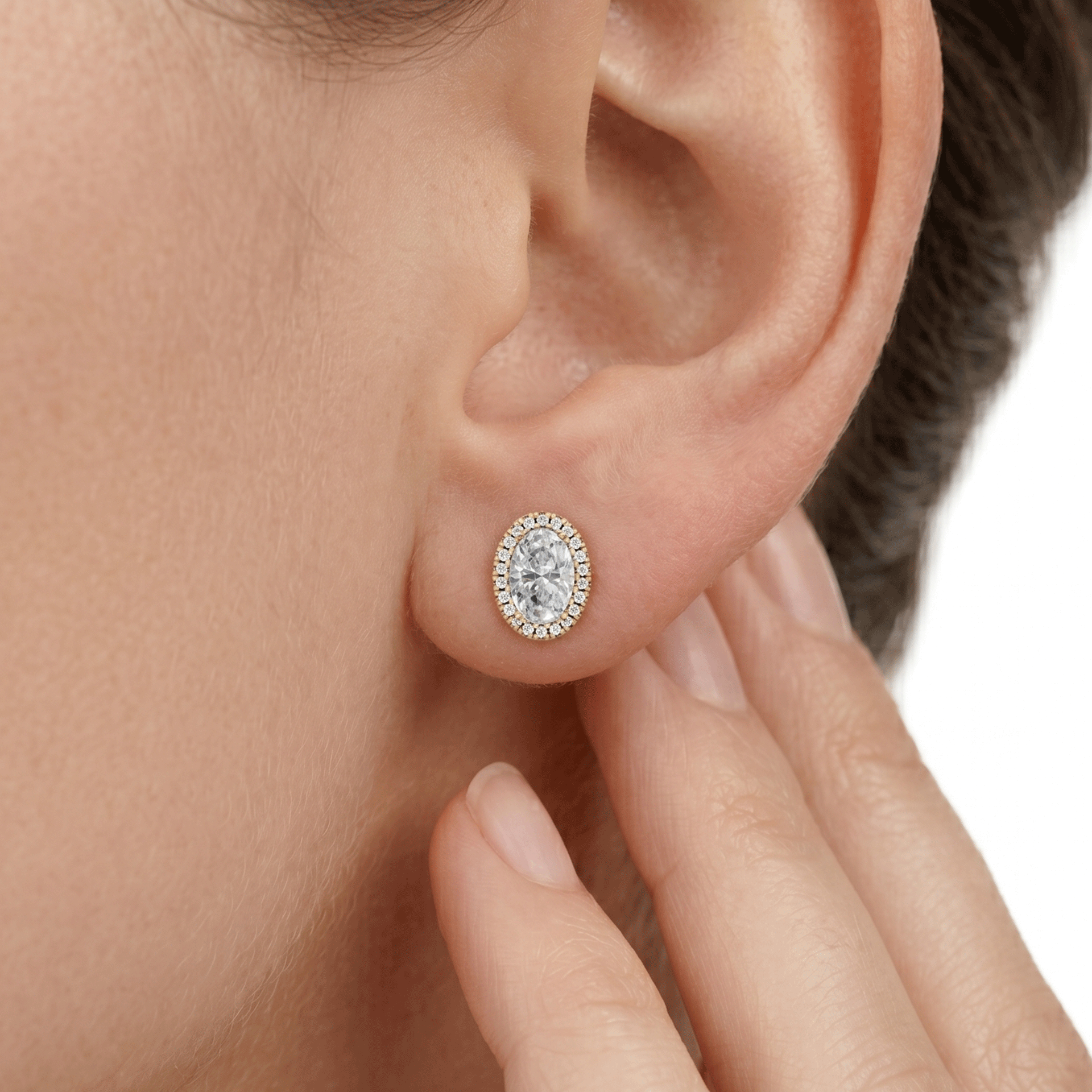 Kiara halo oval diamond stud earrings in yellow gold — earth and grown diamonds by Amber Arc – view 4