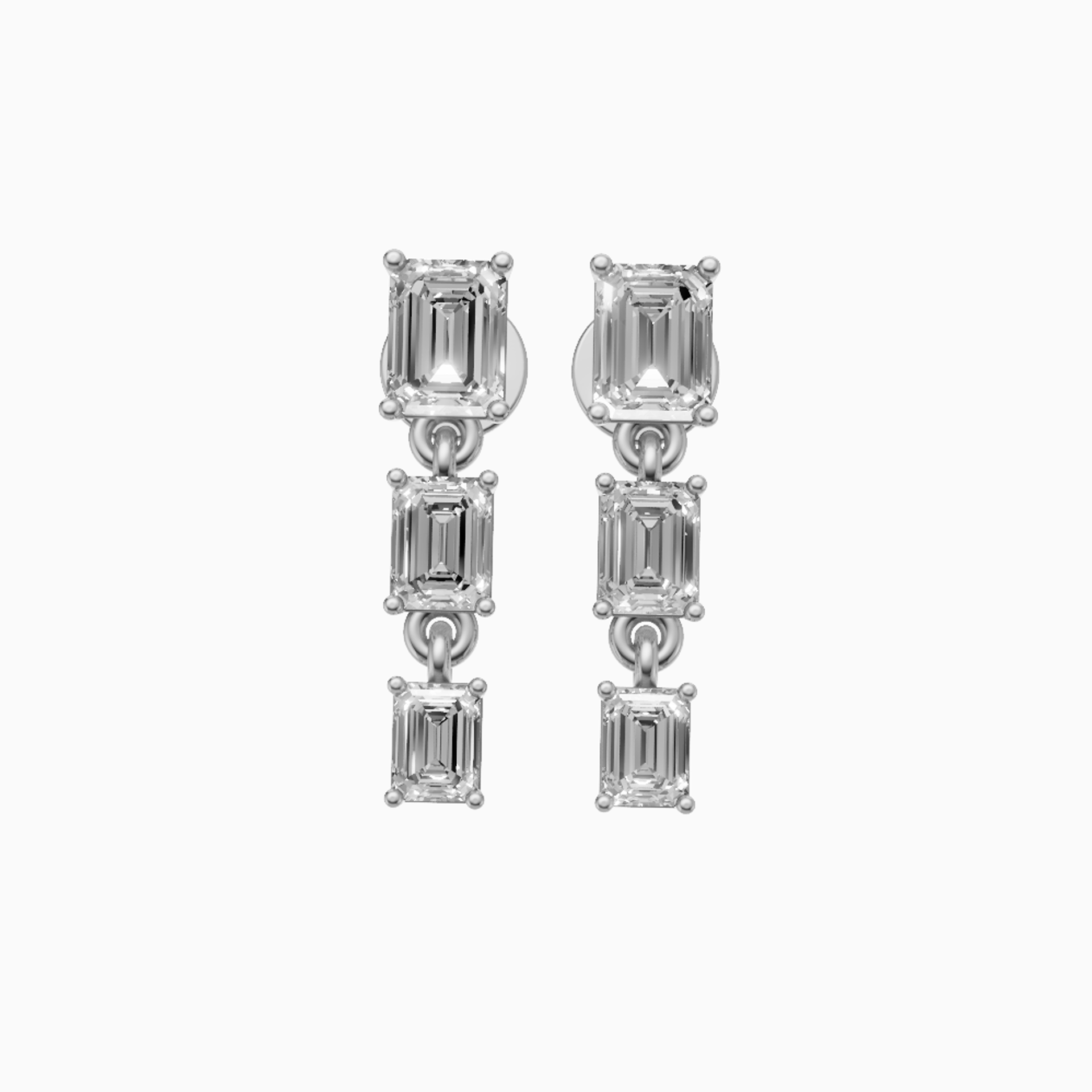Nissa graduated emerald cut drop diamond earrings in yellow gold — earth and grown diamonds by Amber Arc