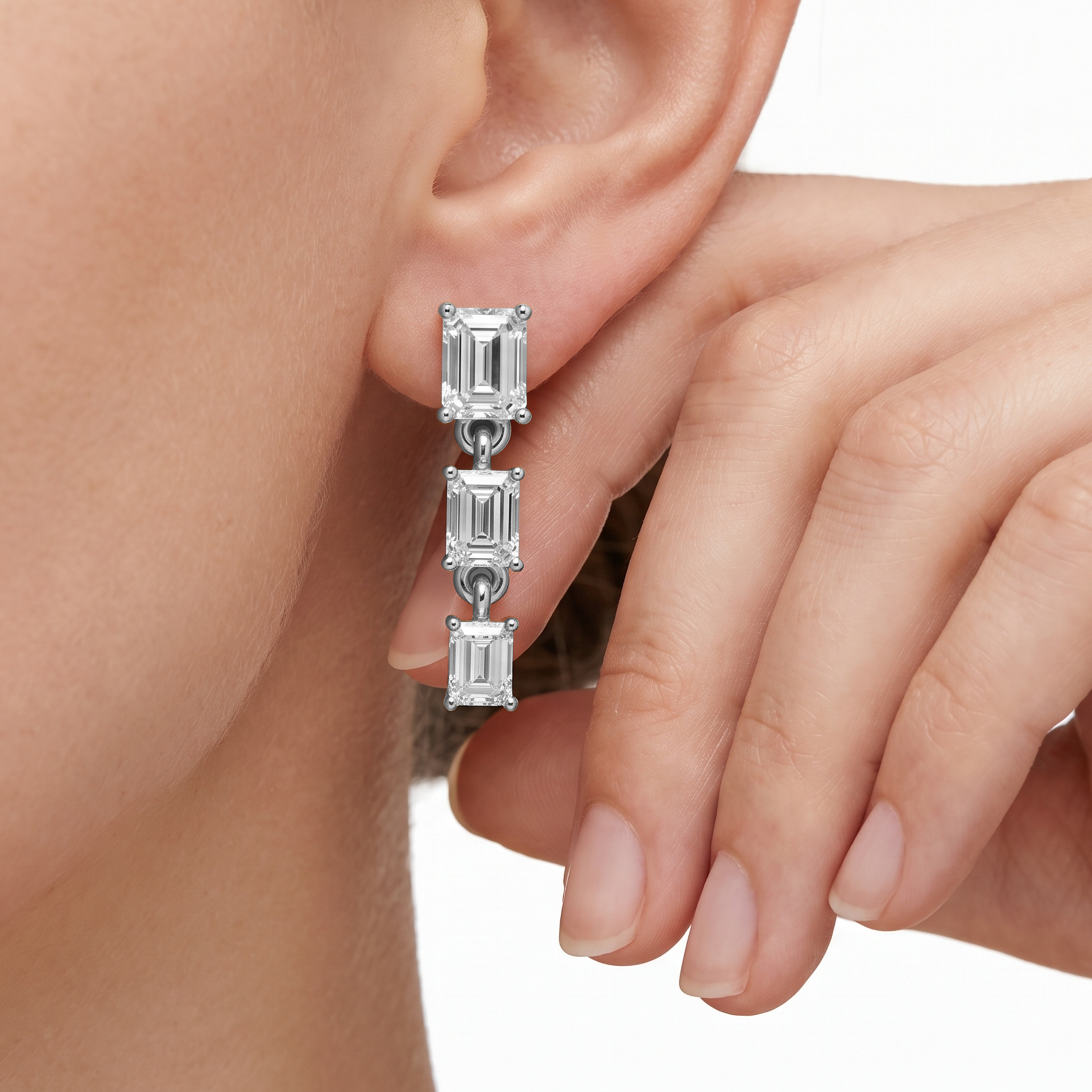 Nissa graduated emerald cut drop diamond earrings in yellow gold — earth and grown diamonds by Amber Arc – view 4