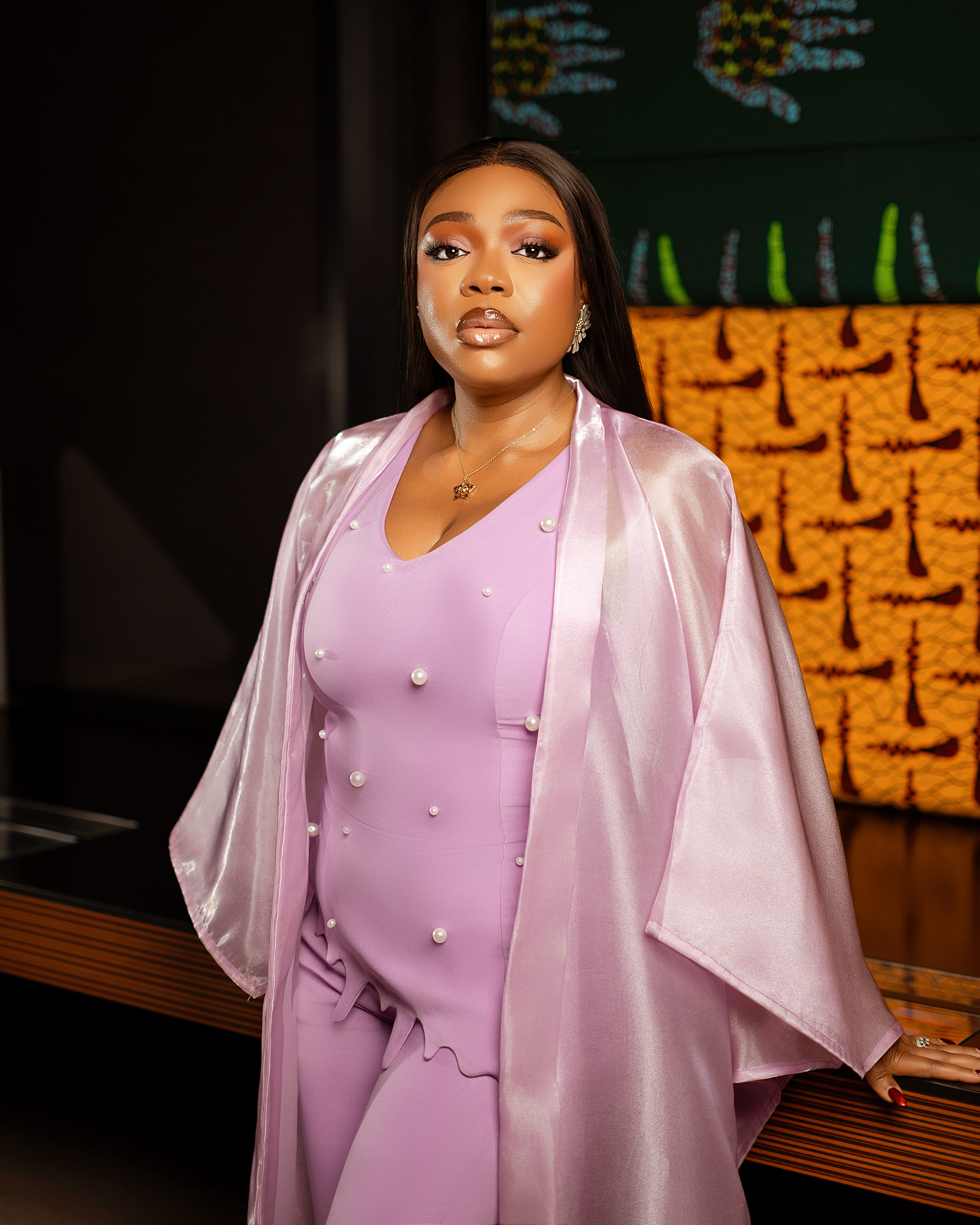 Model in gold metallic kaftan