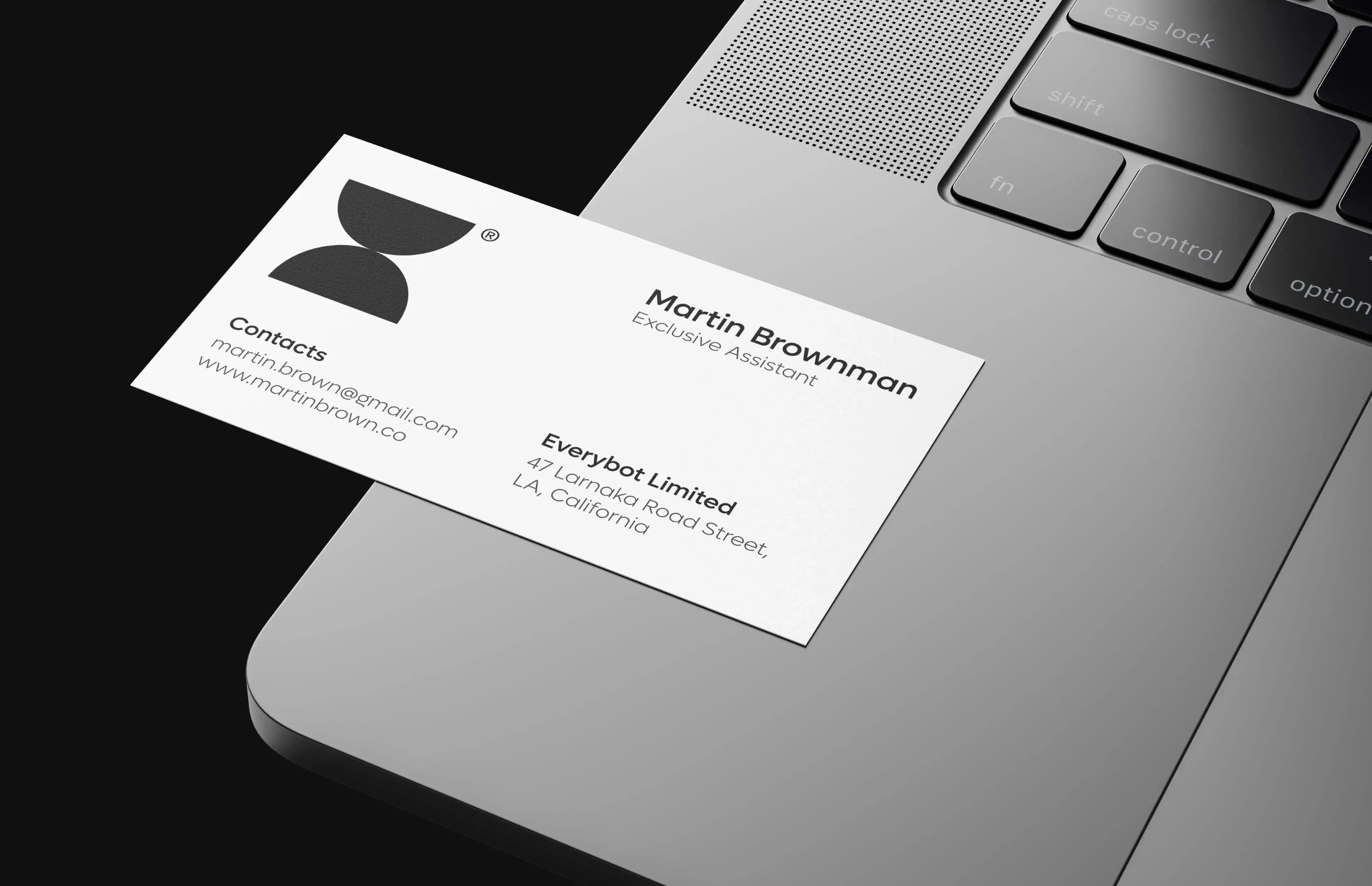 Printed business card or document with silver text, representing a startup mobile app business.