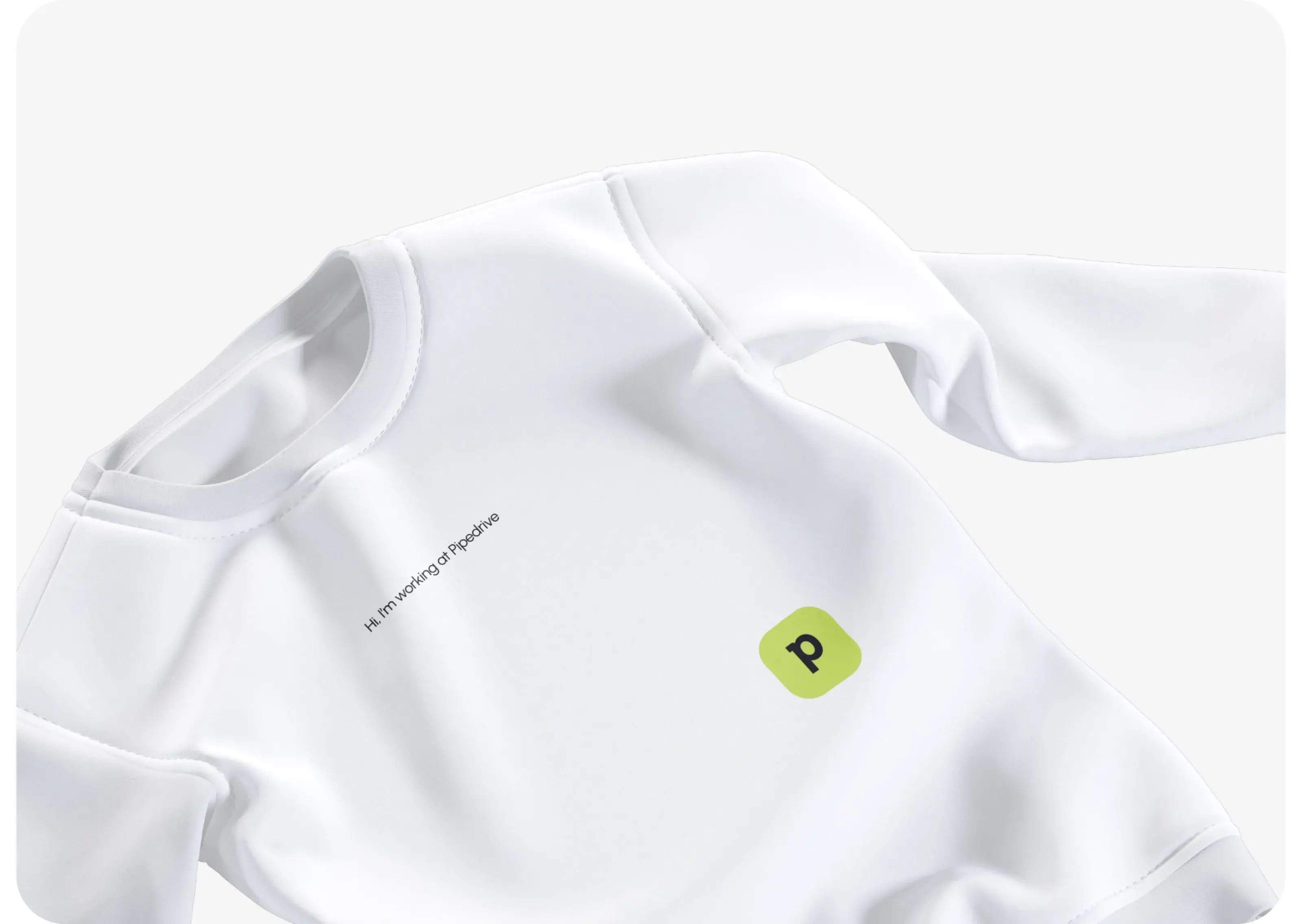 Person wearing shirt with text 'Hi, I'm working at Pipedrive'.