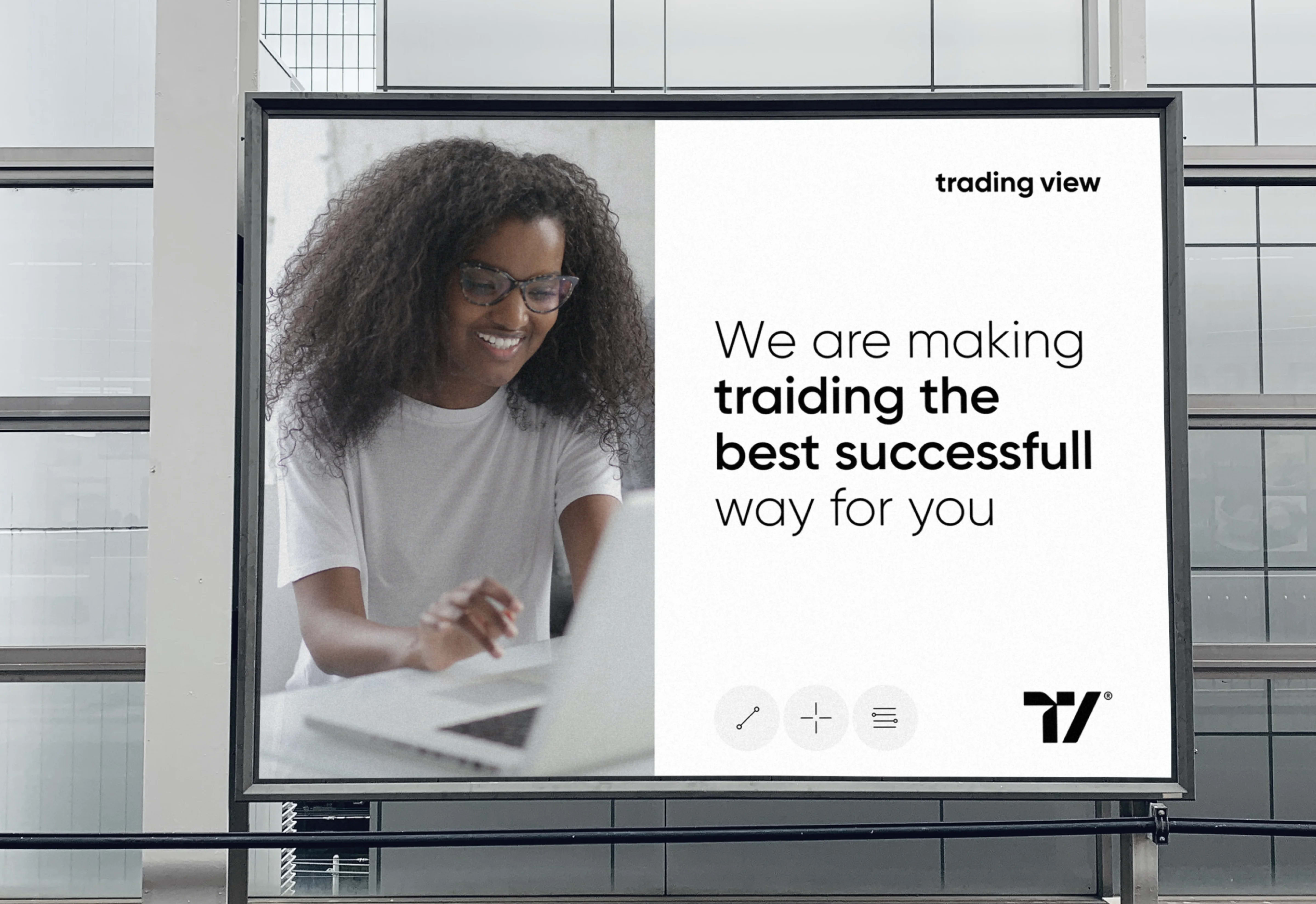 Billboard mockup showing a TradingView ad with text promoting successful trading.