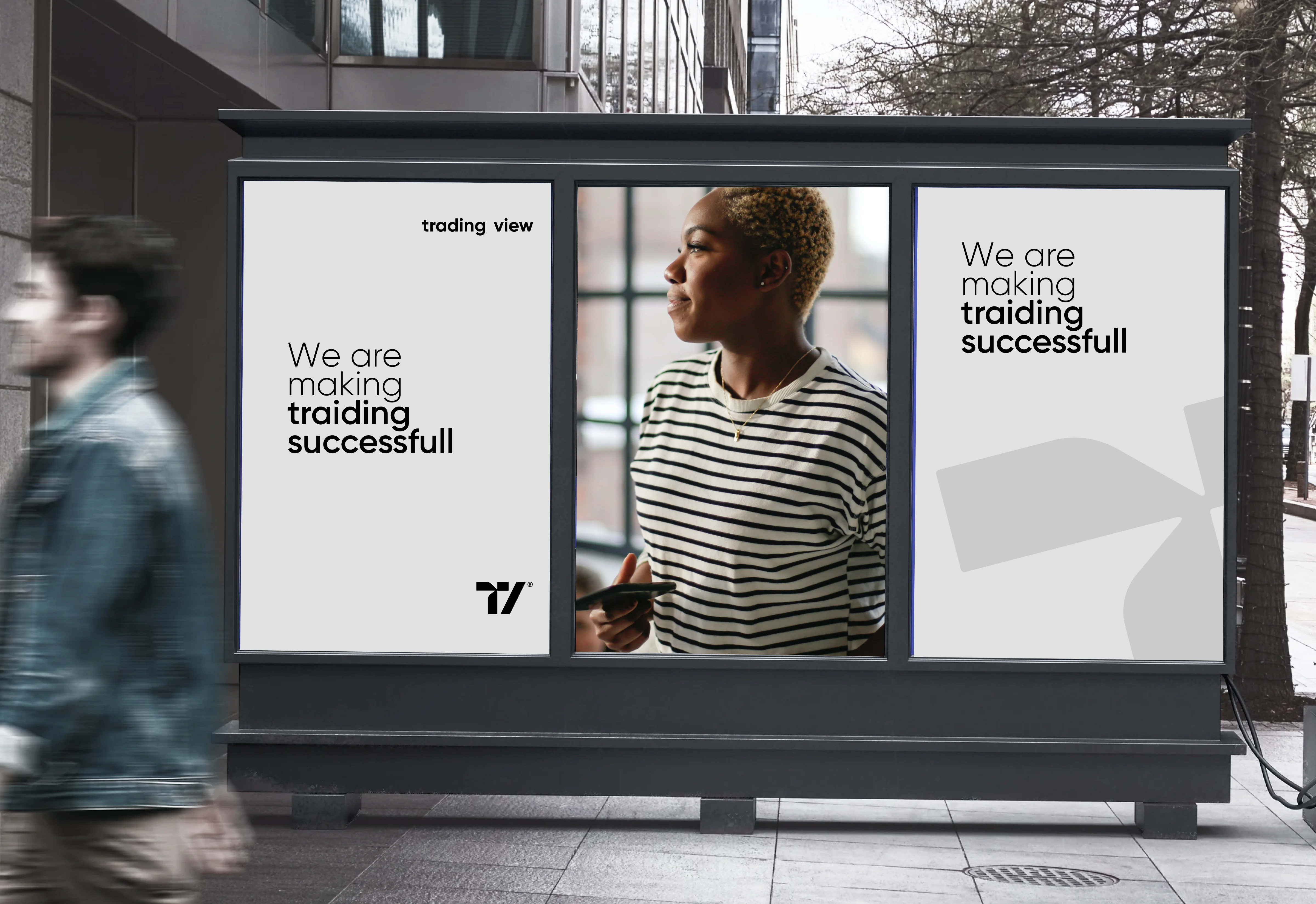 Outdoor advertising mockup for the TradingView platform, featuring its message about making trading successful.