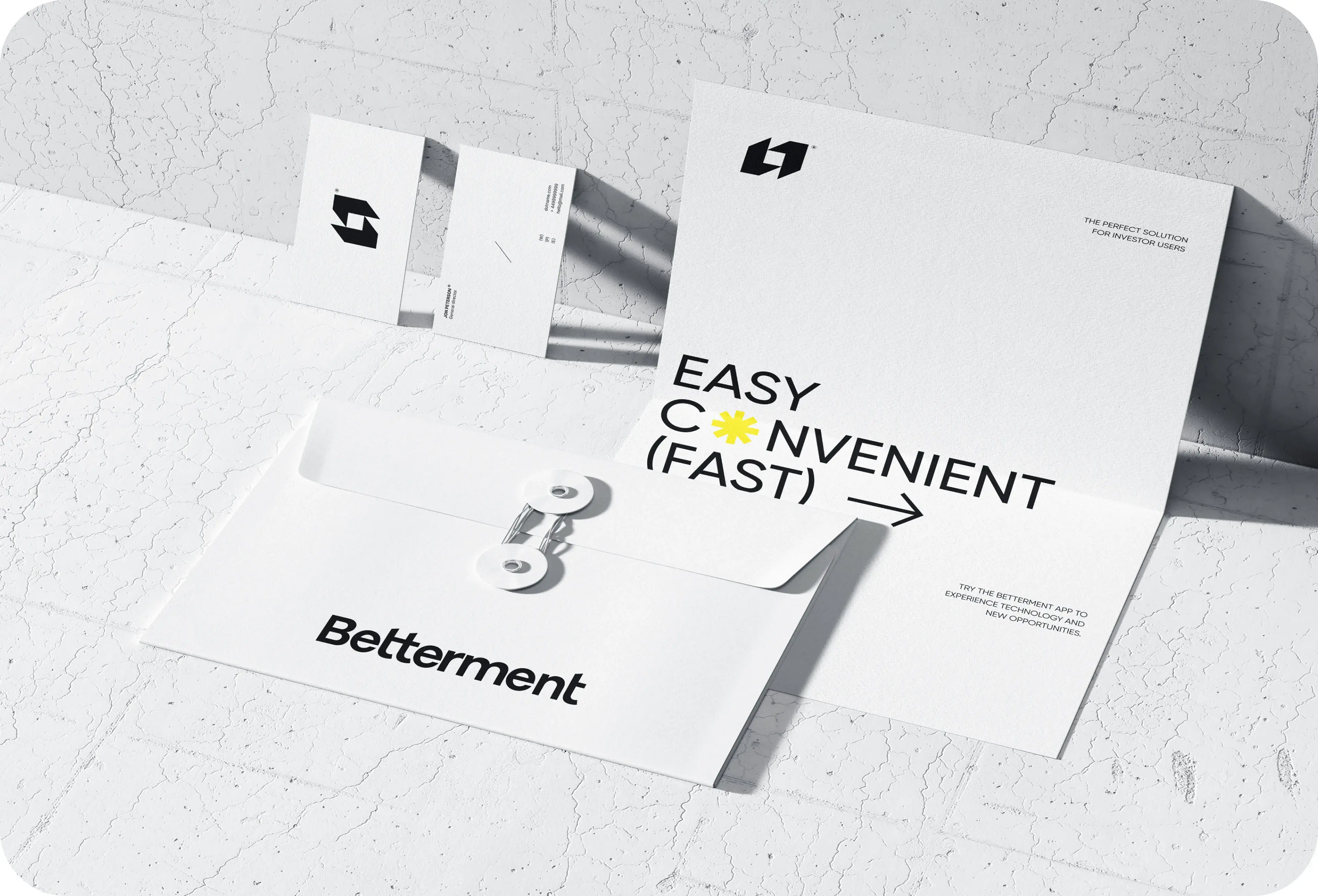 Paper document with graphics showing finance app UX/UI design.