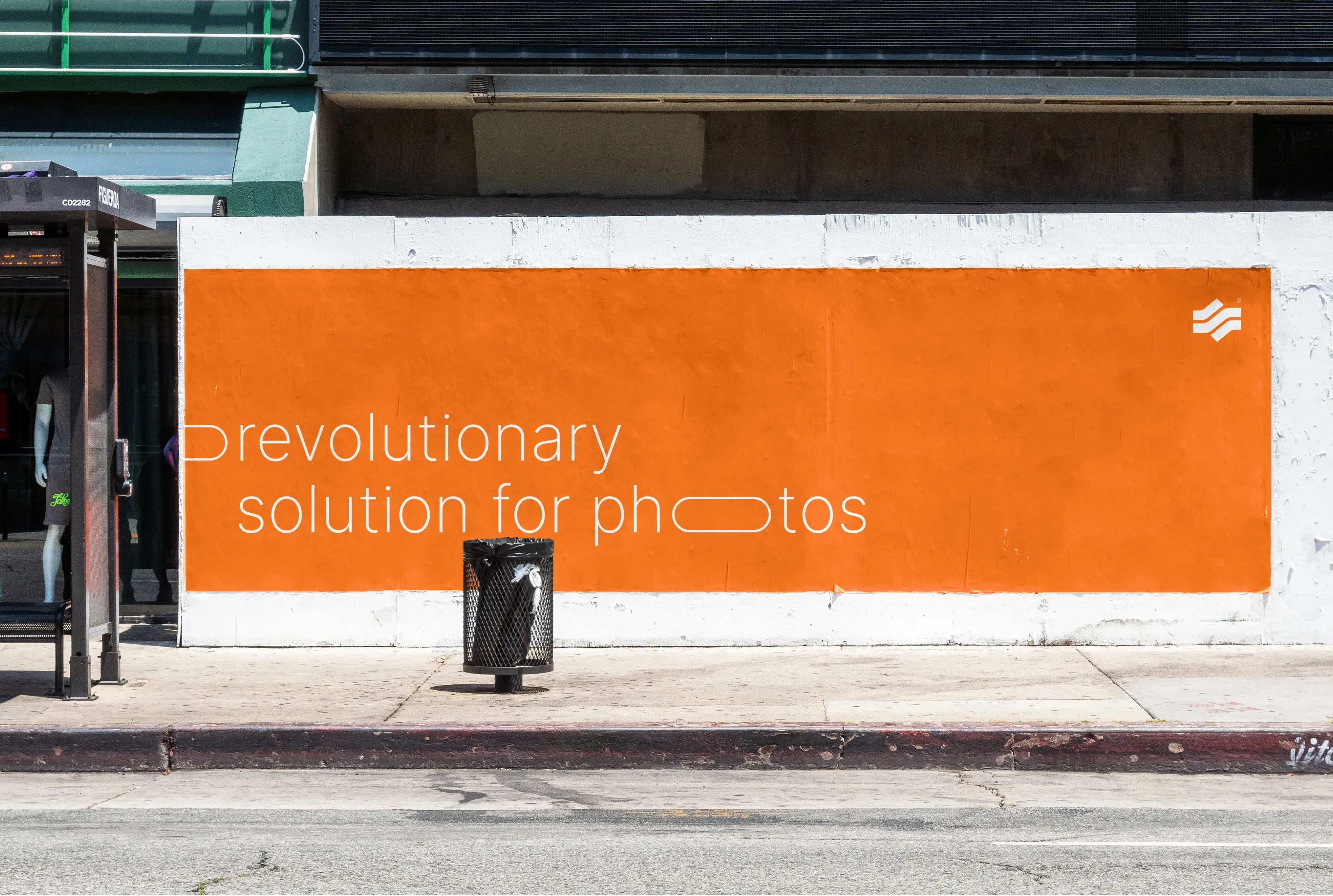 Mockup of a sidewalk billboard displaying text about a "revolutionary solution for photos".