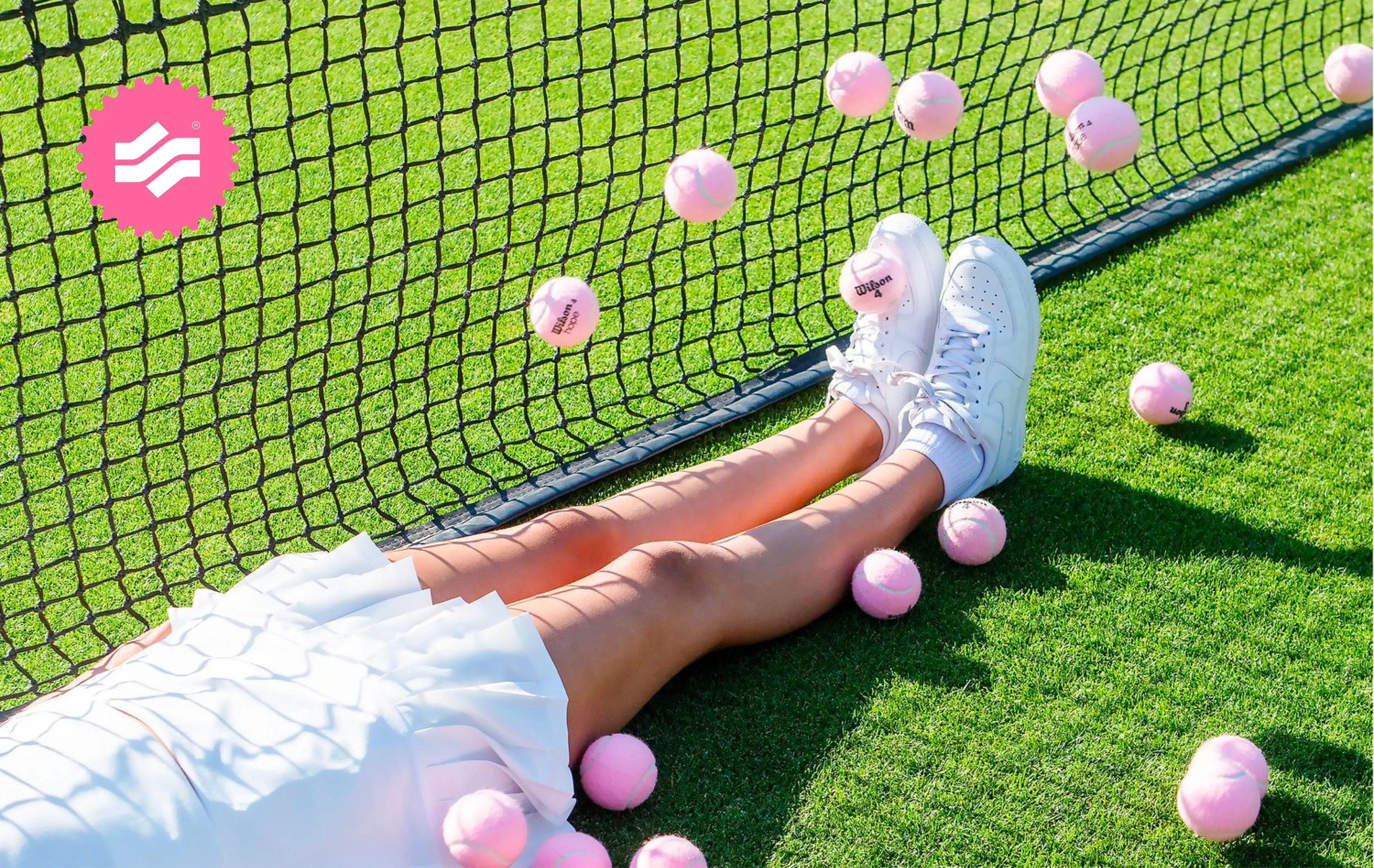 A tennis player hits a pink ball, an active scene relevant to a mobile camera app case study.