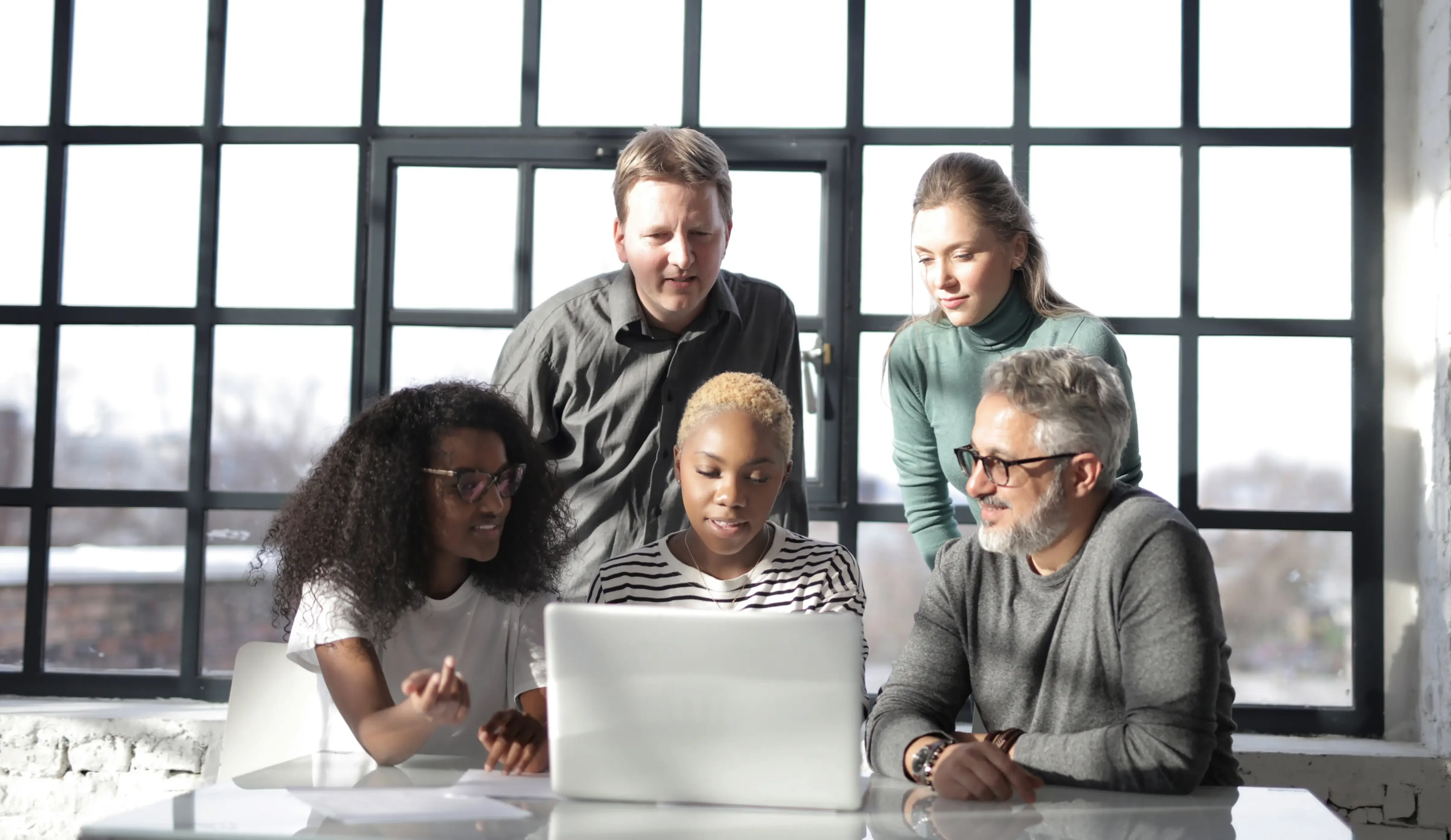 People engage with a presentation likely concerning enterprise finance and service management software.