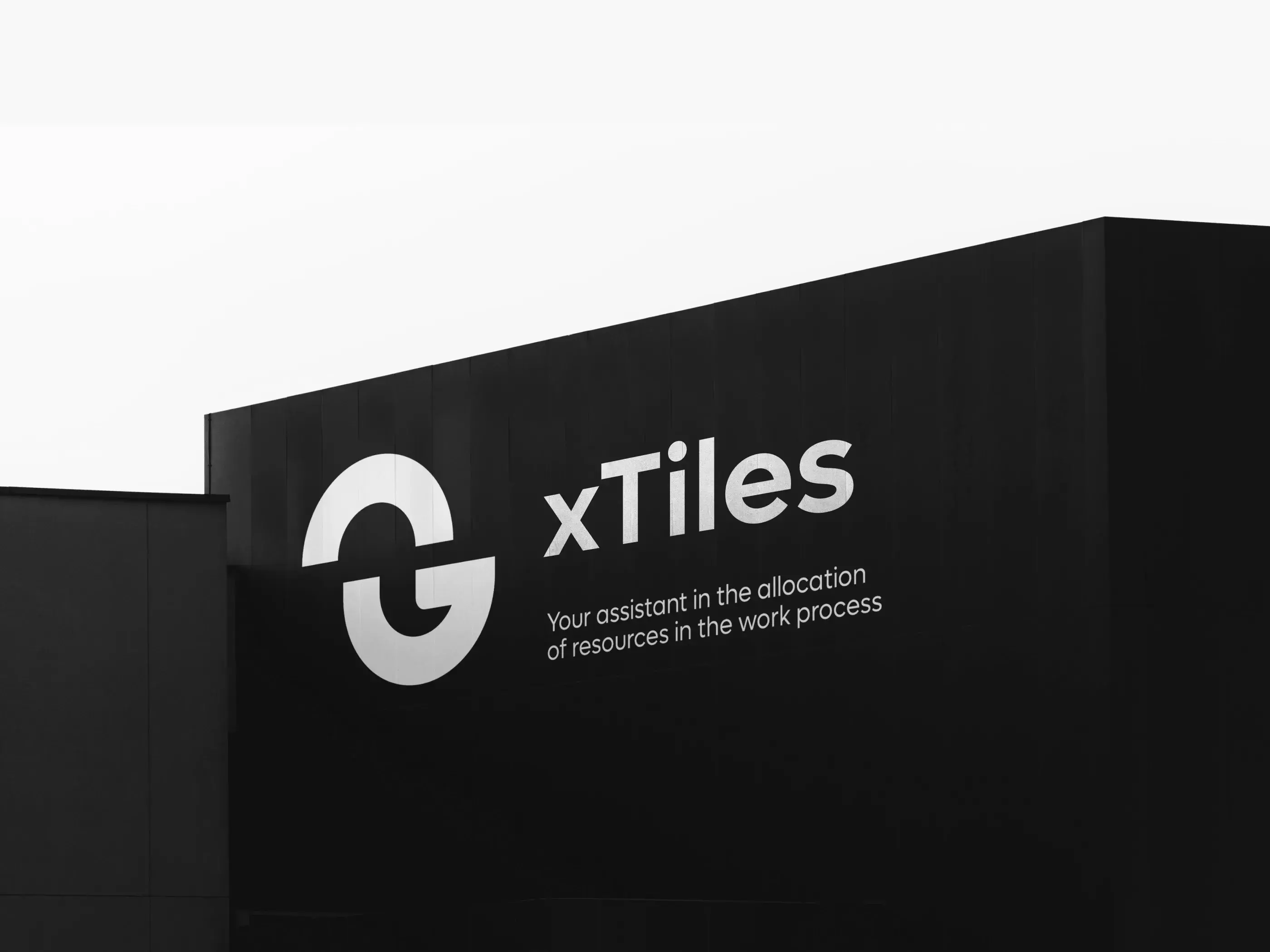 xTiles CRM resource allocation software branding graphic featuring logo and text: "Your assistant in the allocation of resources".