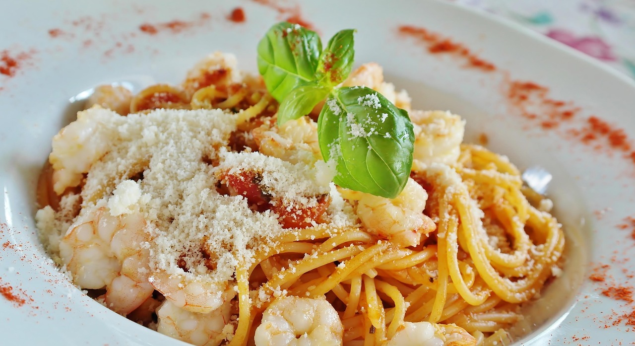 Sauté shrimp in garlic butter, toss with spaghetti, lemon juice, and parsley.