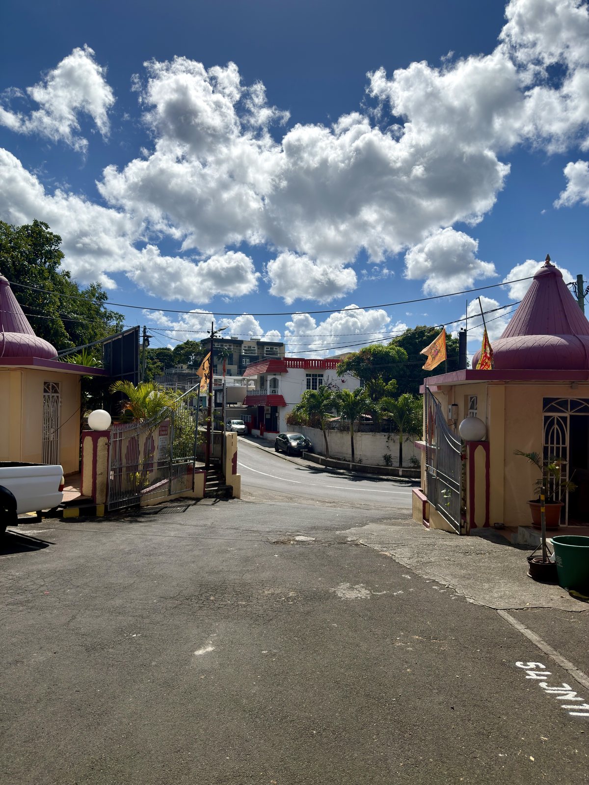 A Hindu temple gateway in Mauritius under a bright sky