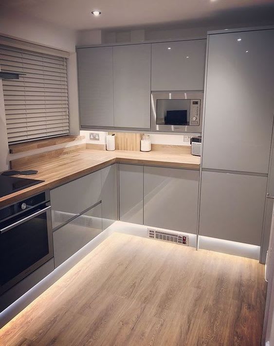 Kitchen with soft lighting and modern cabinet finish