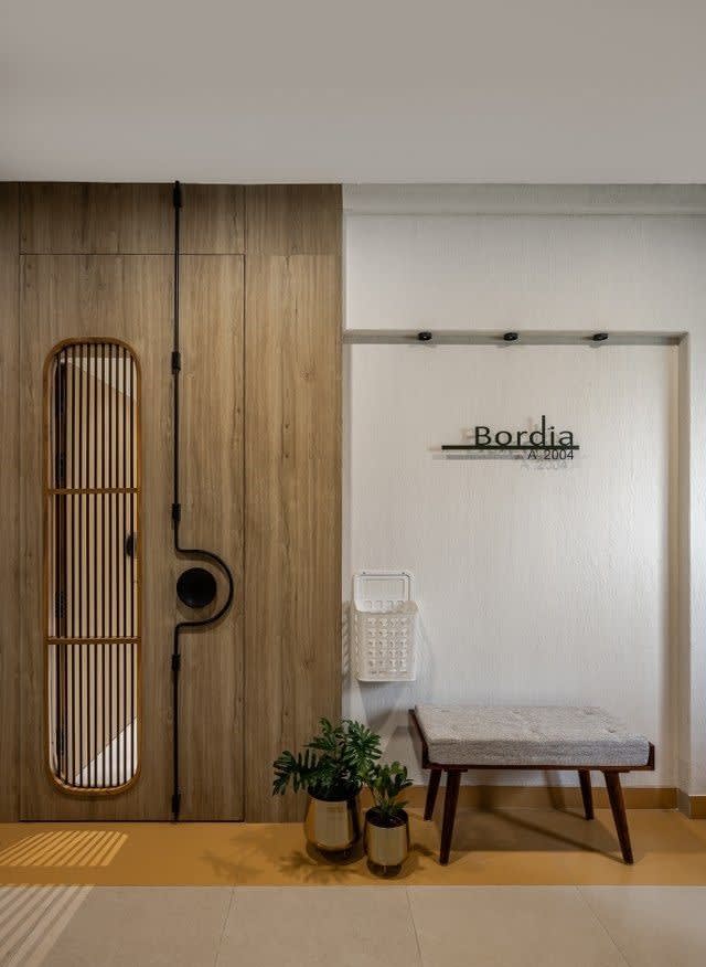 Wardrobe design with glass panels and internal lighting