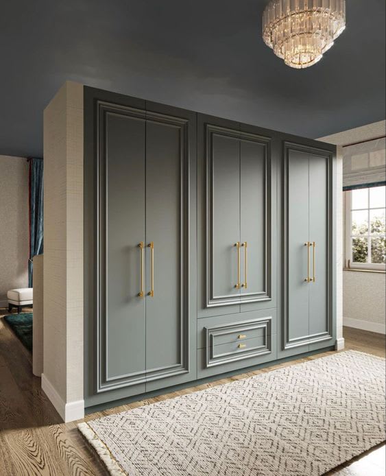 Sliding wardrobe with mirrored finish and dark frame
