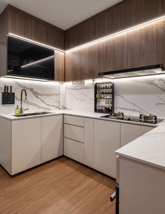 Kitchen space with wood finish cabinets and lighting details