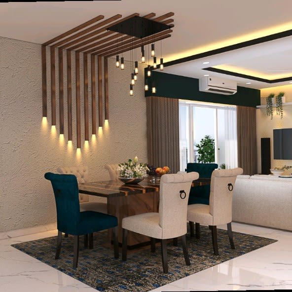 Dining room by Vyom Interiors Delhi with wooden table, cushioned chairs, and pendant lighting