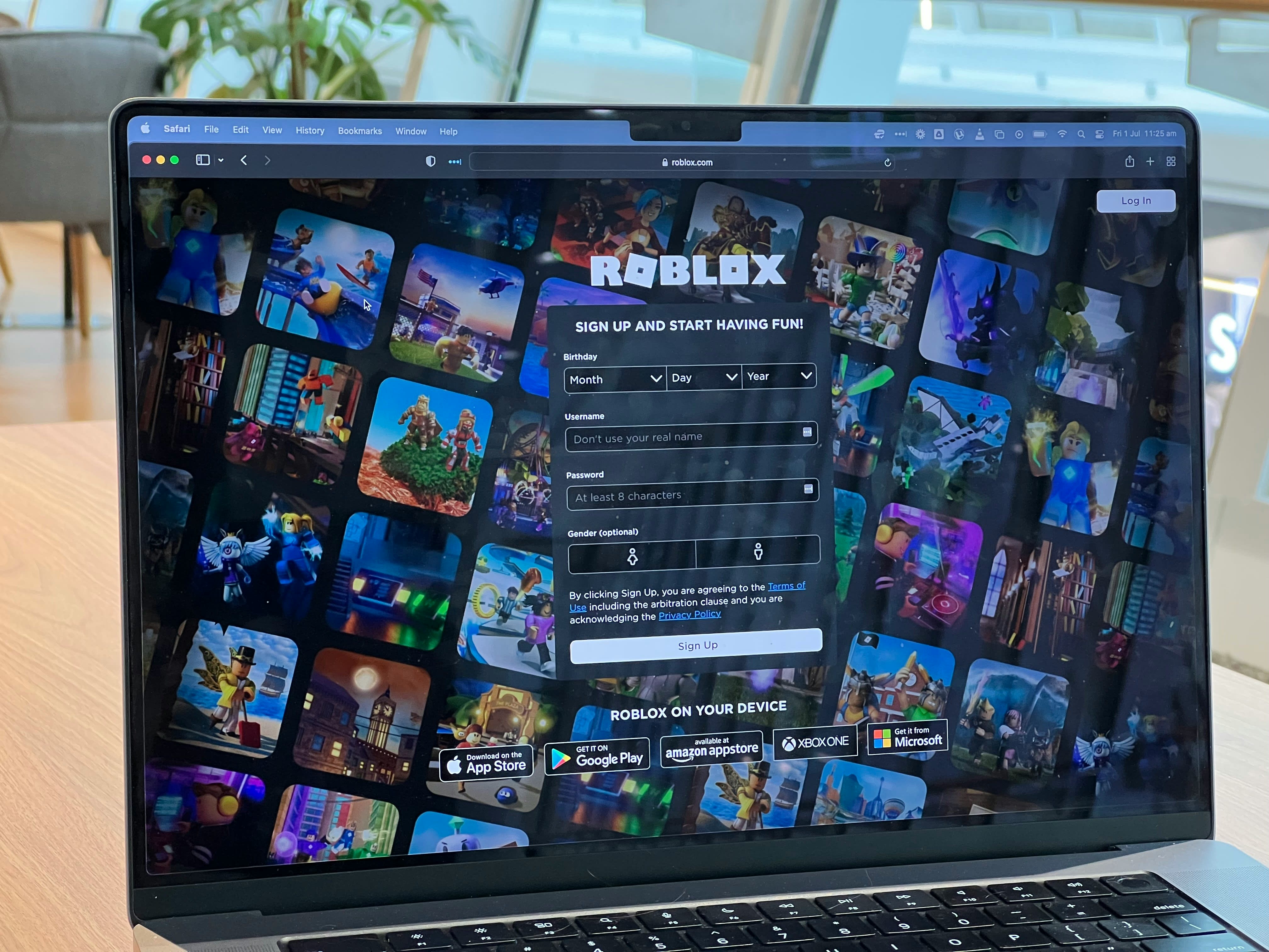 A Laptop Screen Showing Roblox Website Homepage