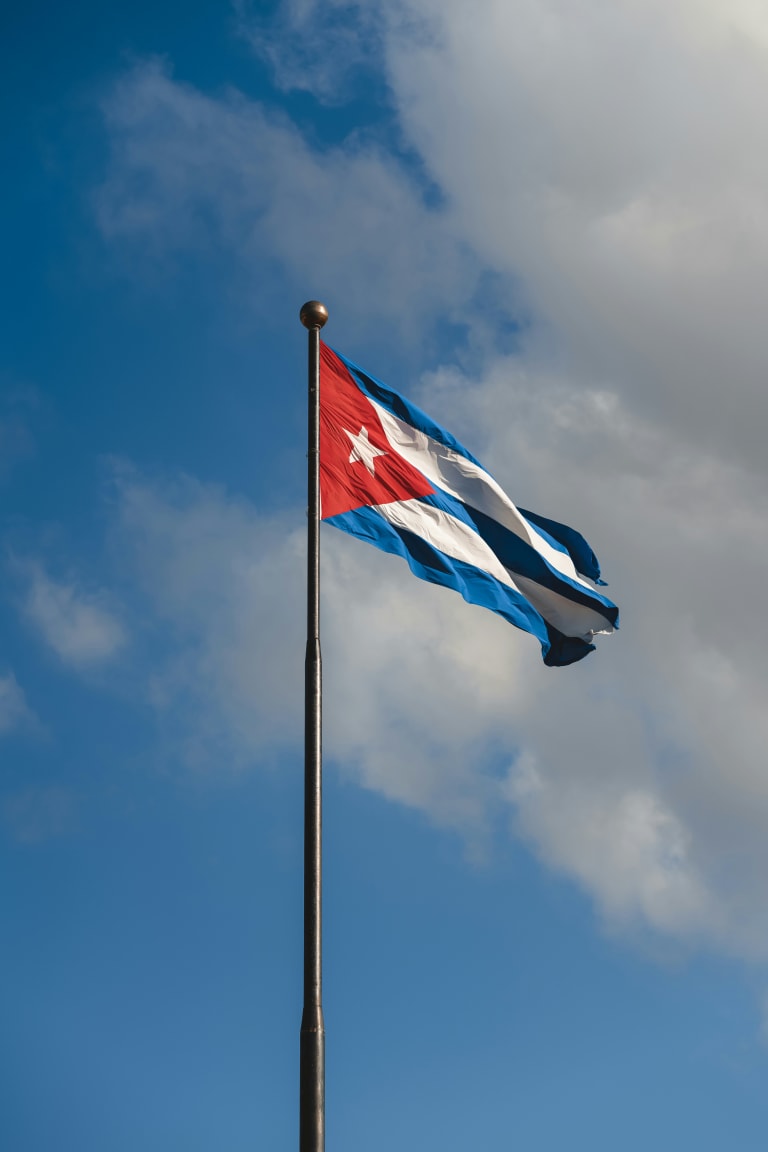 Cuba Flag Flying in the Wind on a Cloudy Day