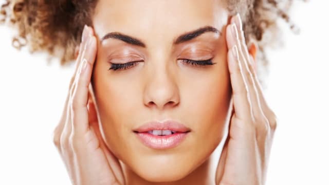 Massage your temples or shoulders