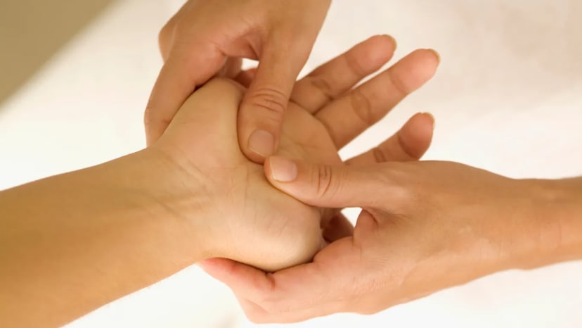Daily habit: Press your thumb into the center of your palm