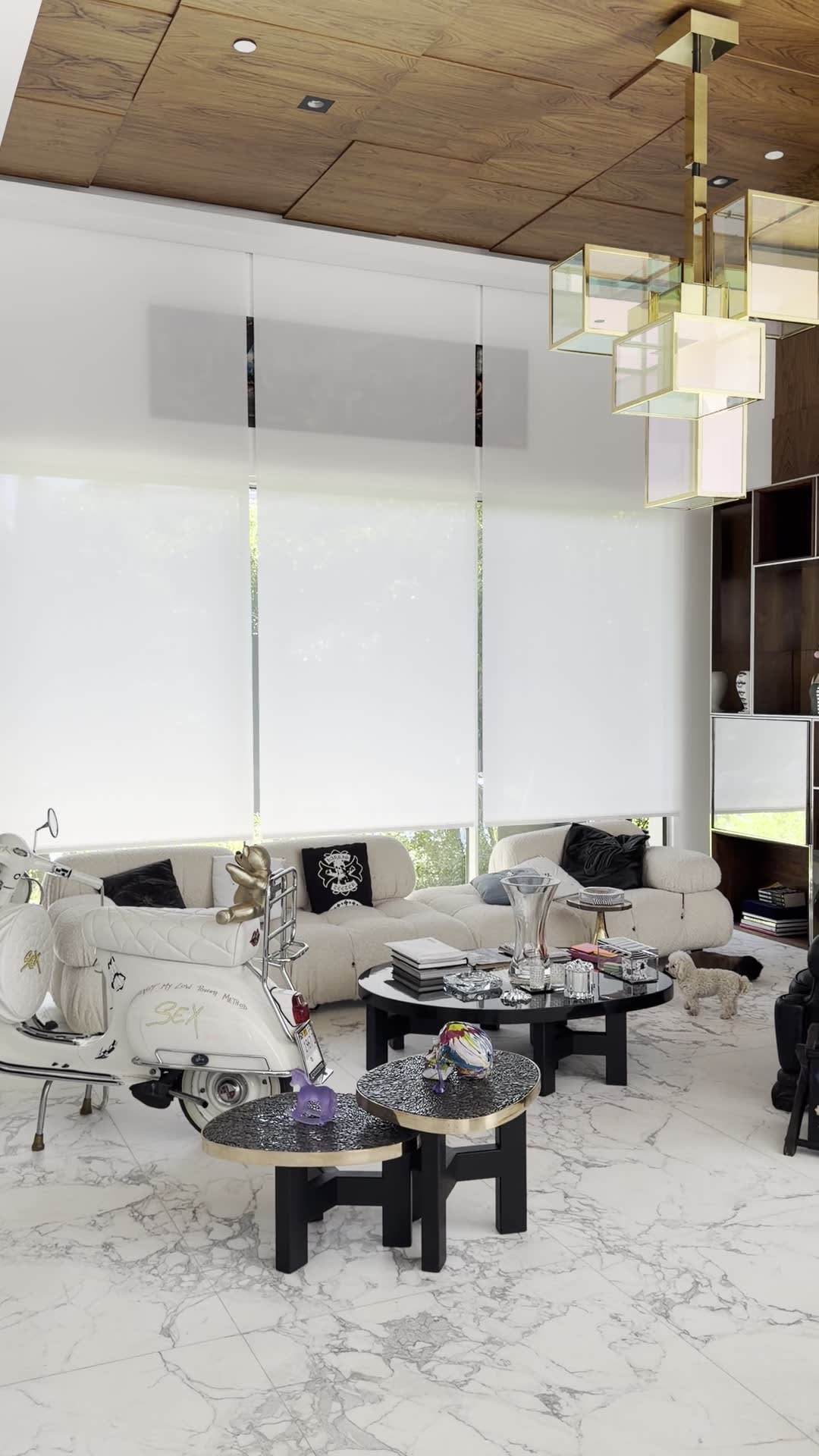 Motorized roller shades in a luxury living room with floor-to-ceiling windows — Ermine Smart Home, Los Angeles